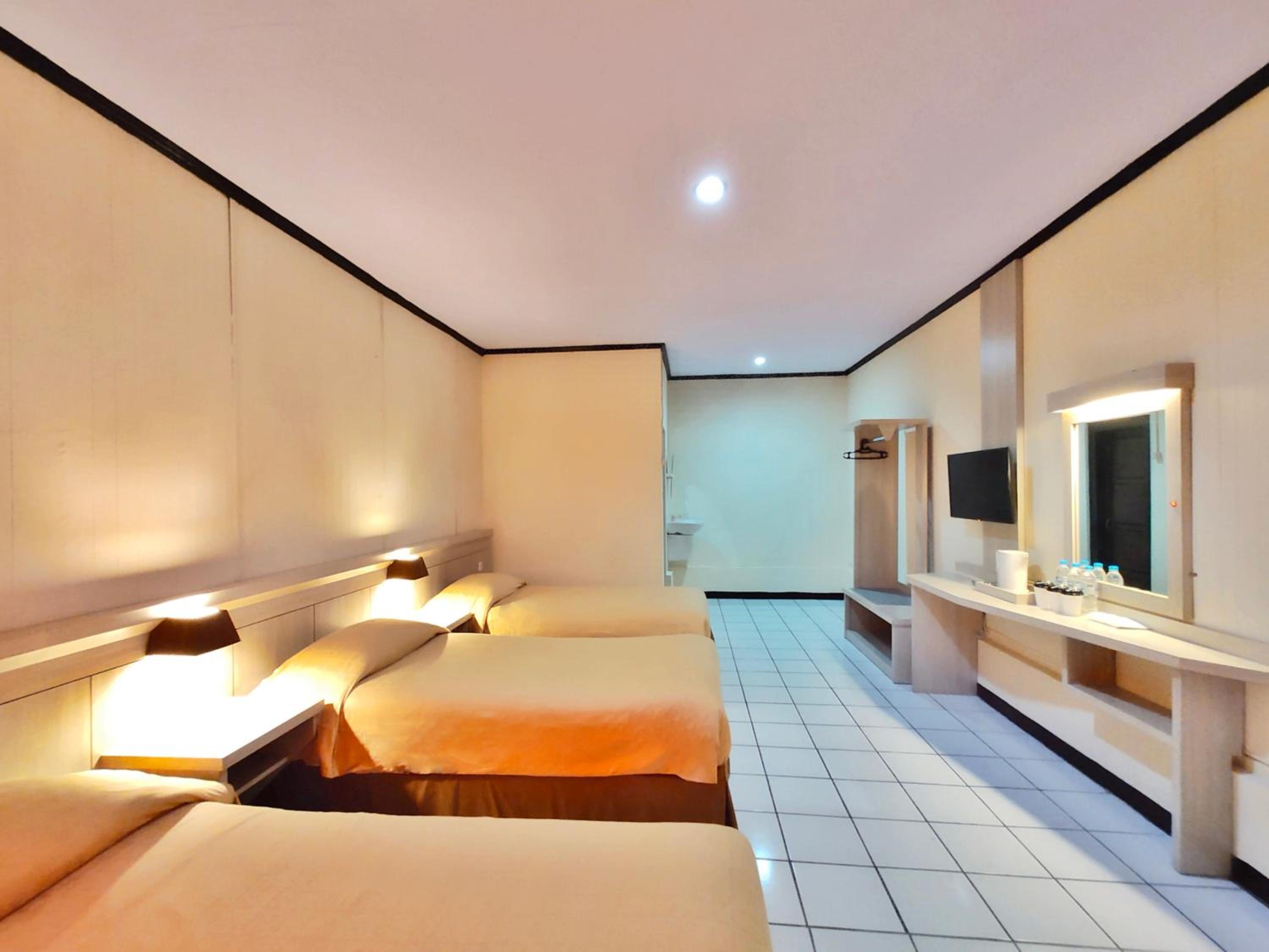 Standard Triple Room - Photo 8