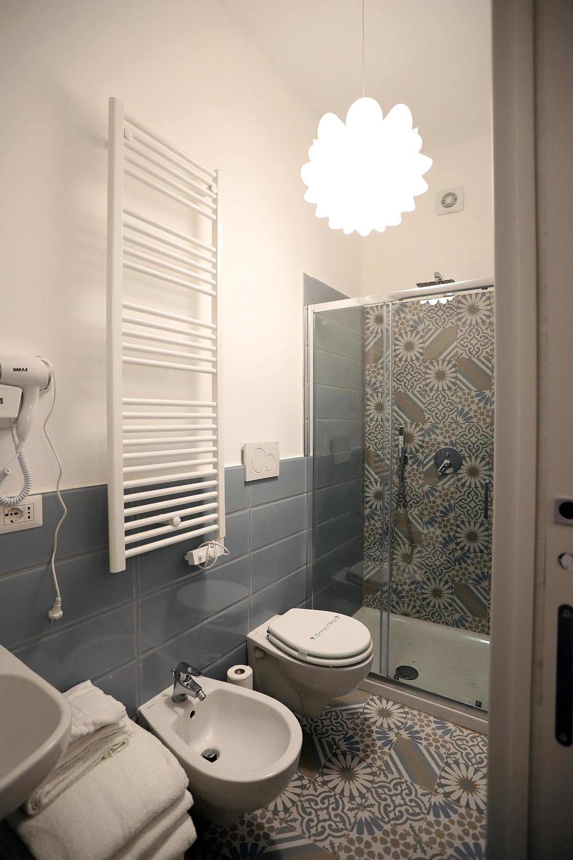 Quadruple Room with Balcony photo 3