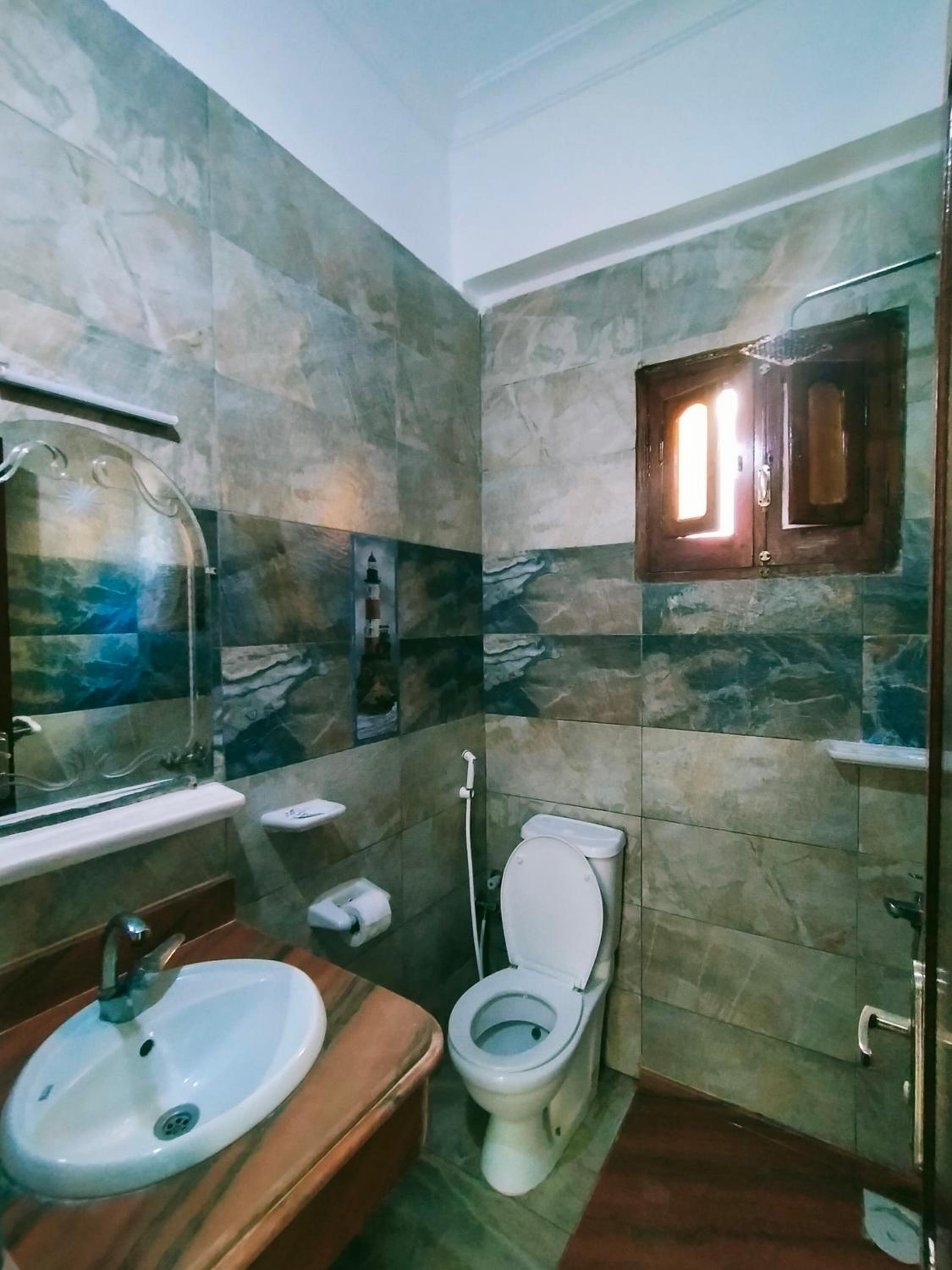 Economy Quadruple Room - Photo 1
