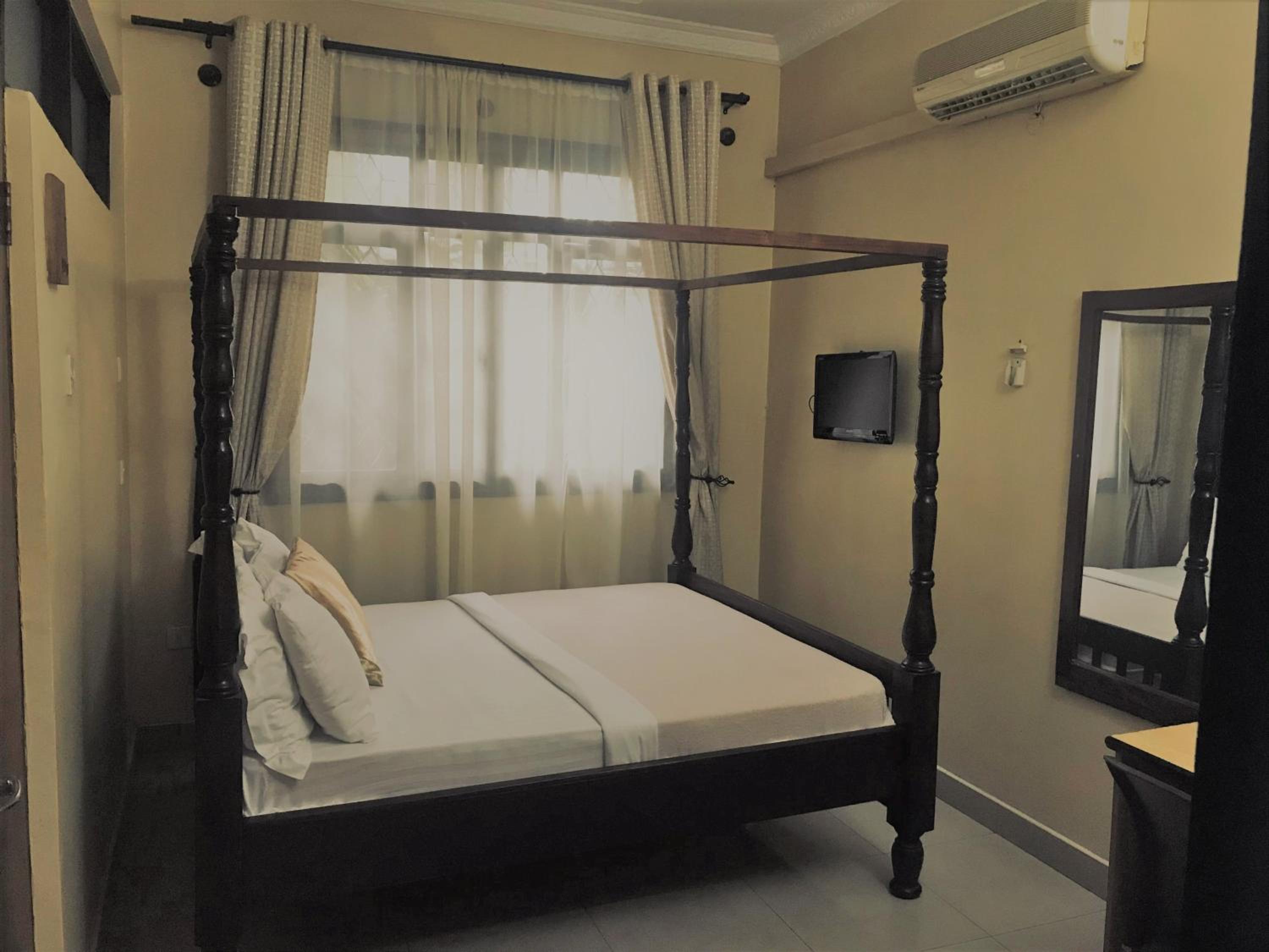 Deluxe Triple Room - Photo 1