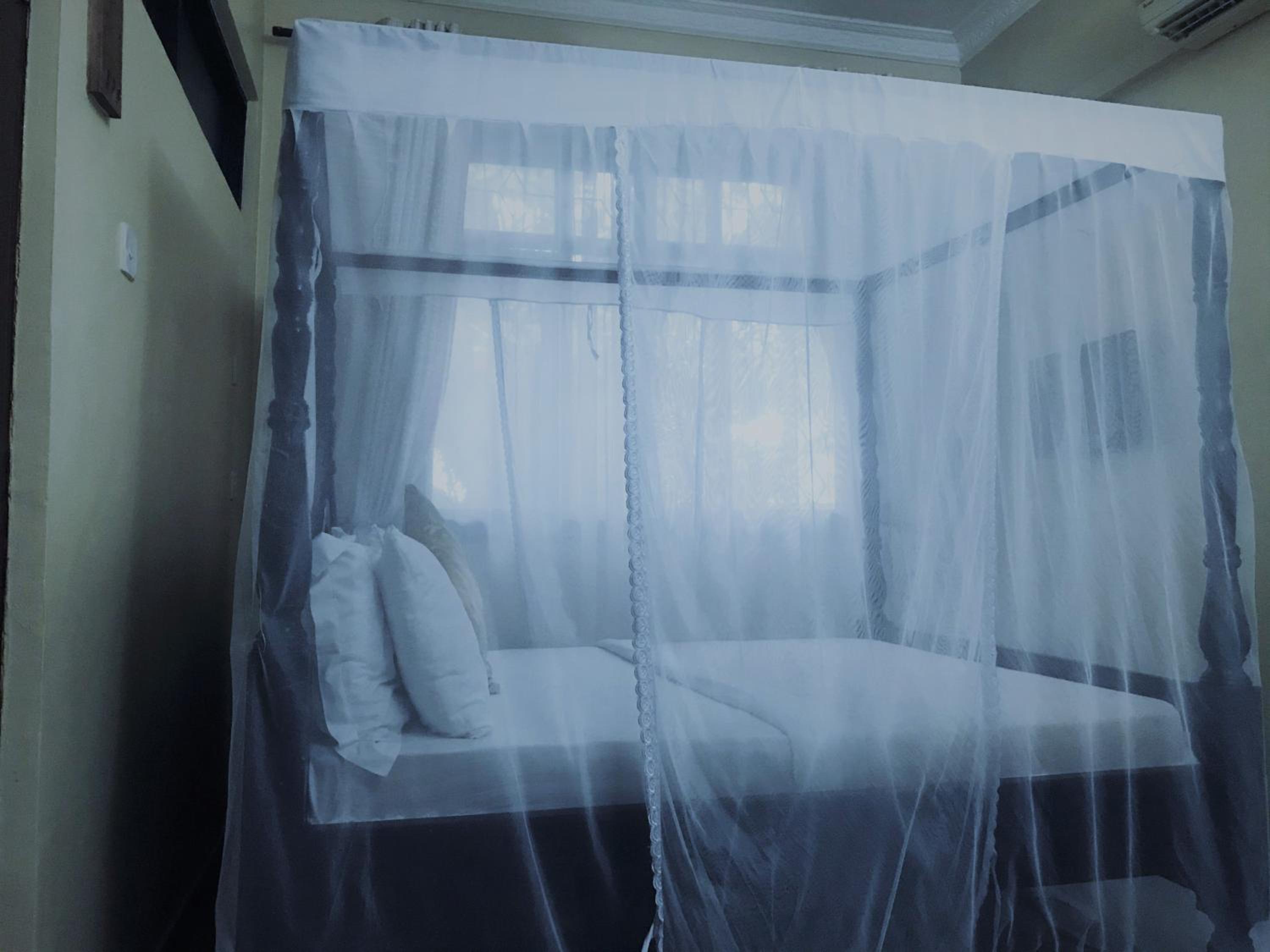 Deluxe Triple Room - Photo 7