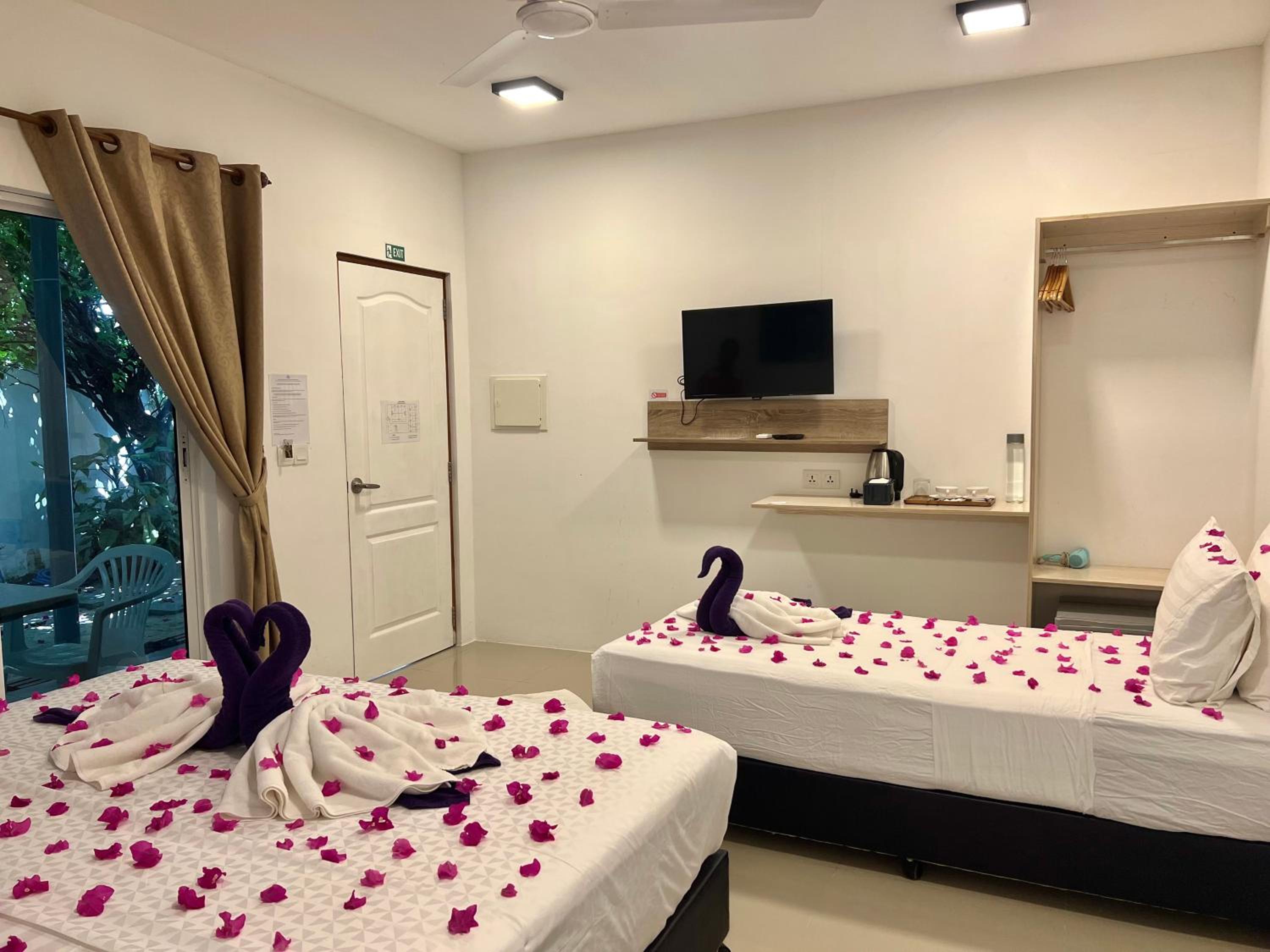 Deluxe Triple Room
