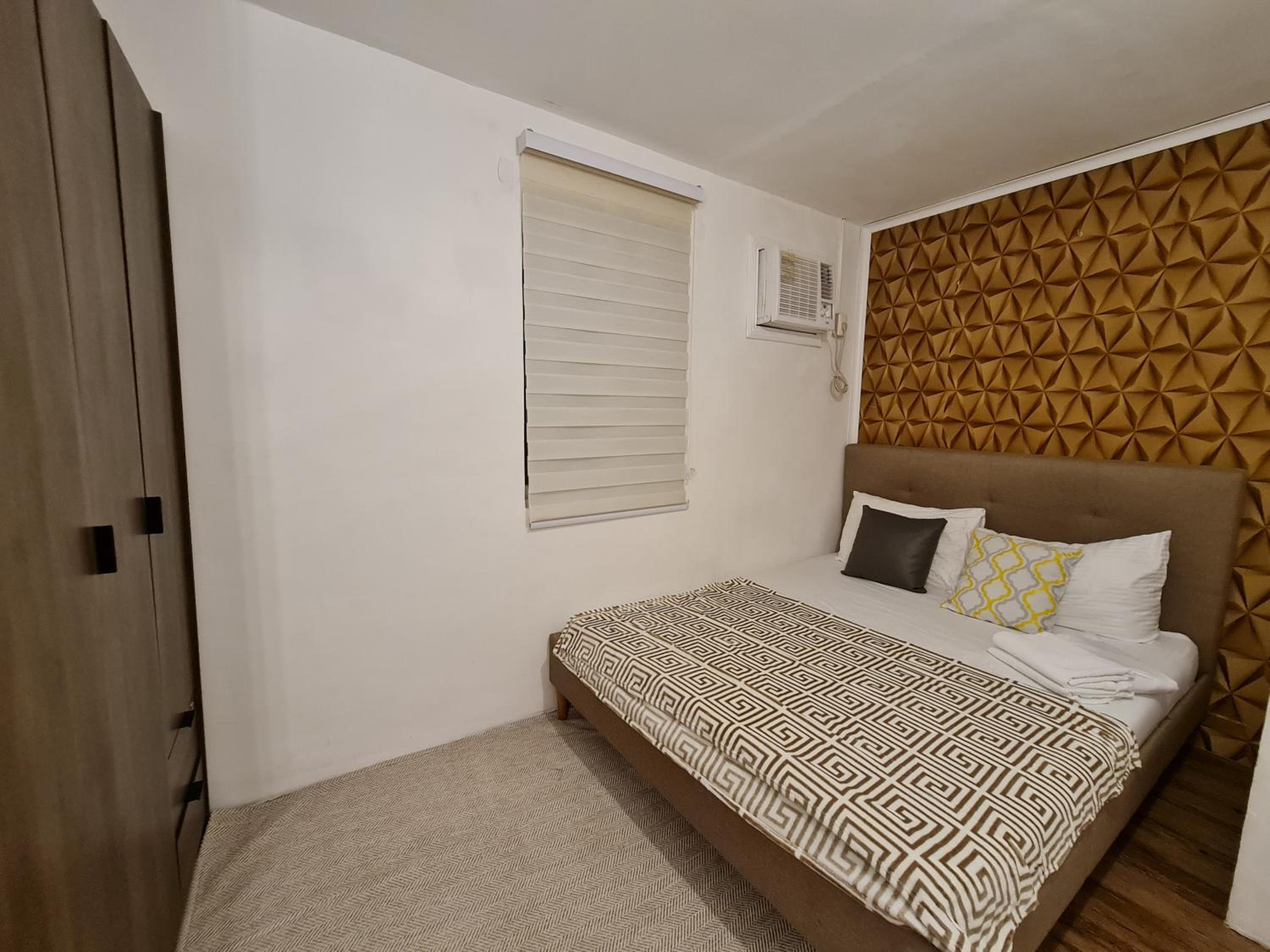Three-Bedroom Apartment - Photo 10