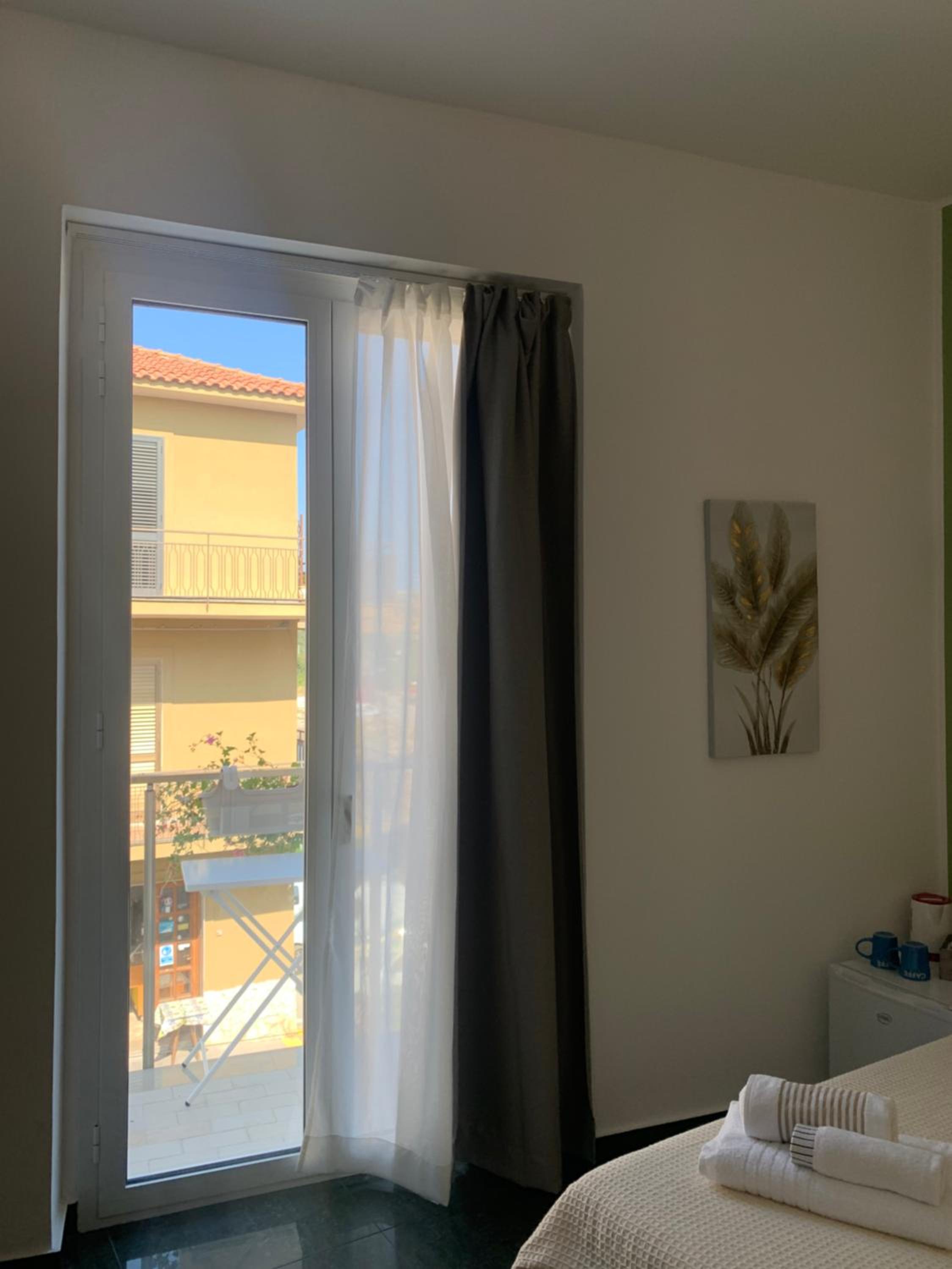 Quadruple Room with Balcony photo 3