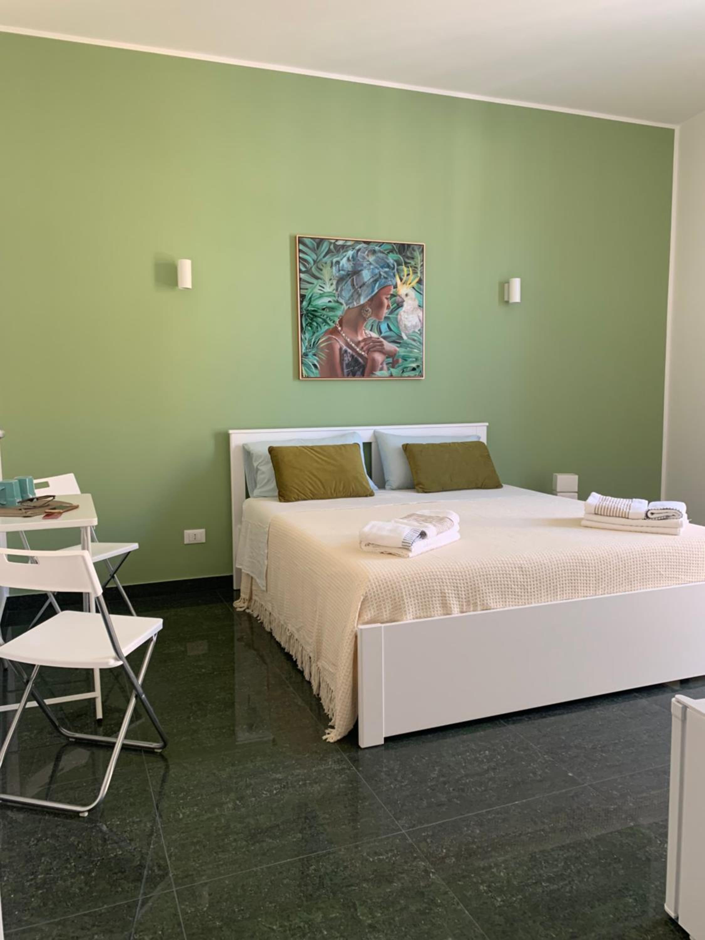 Quadruple Room with Balcony photo 2