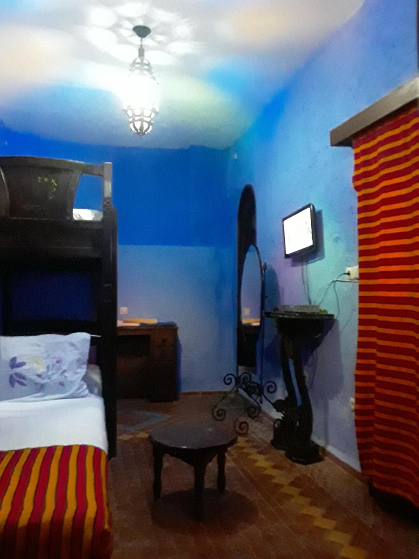 Economy Quadruple Room - Photo 4