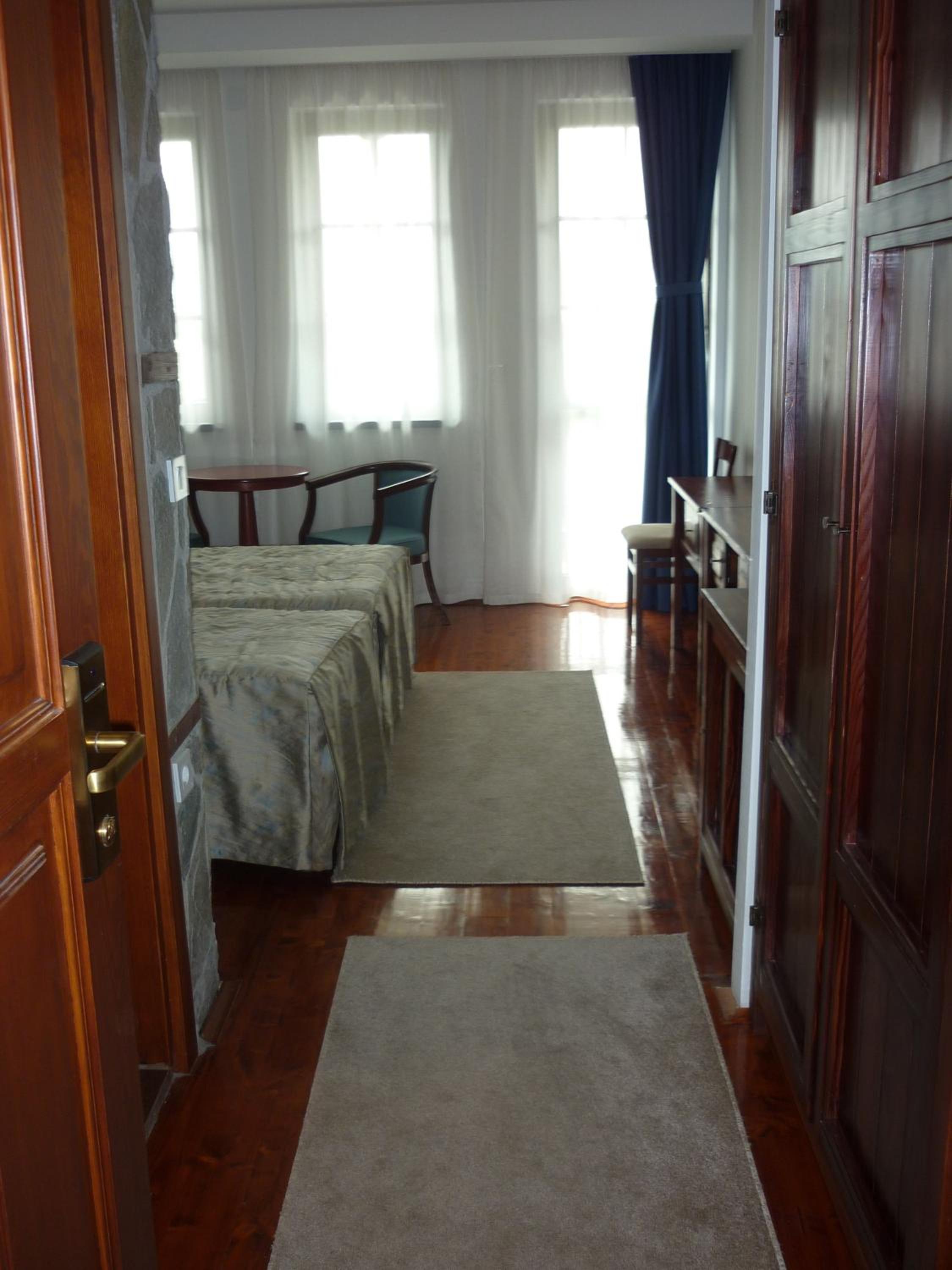 Twin Room with Extra Bed and Balcony - Photo 1
