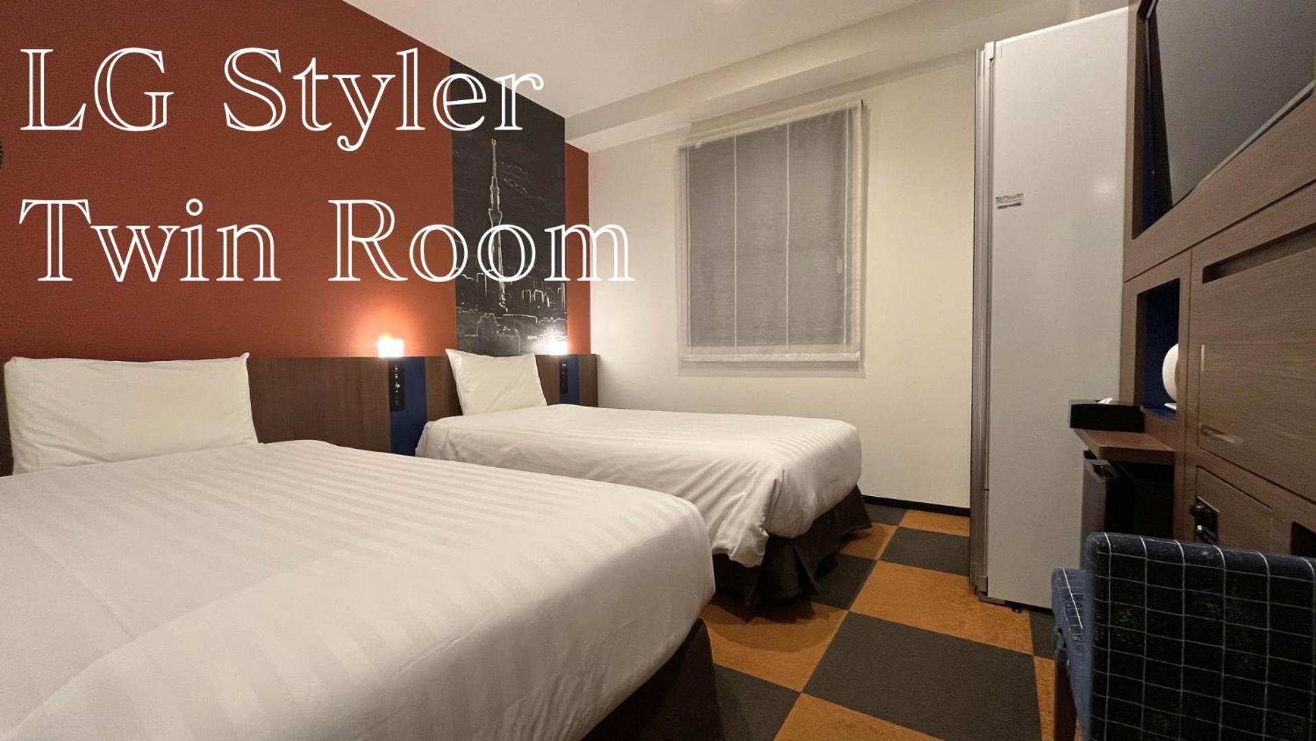 Twin Room - (LG Styler) - Non-Smoking photo 1