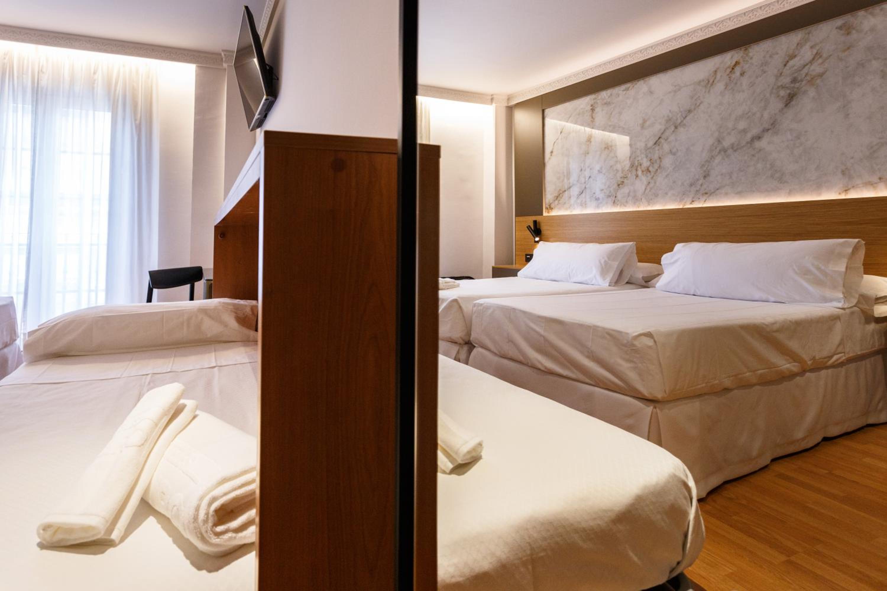 Triple Room - Photo 1