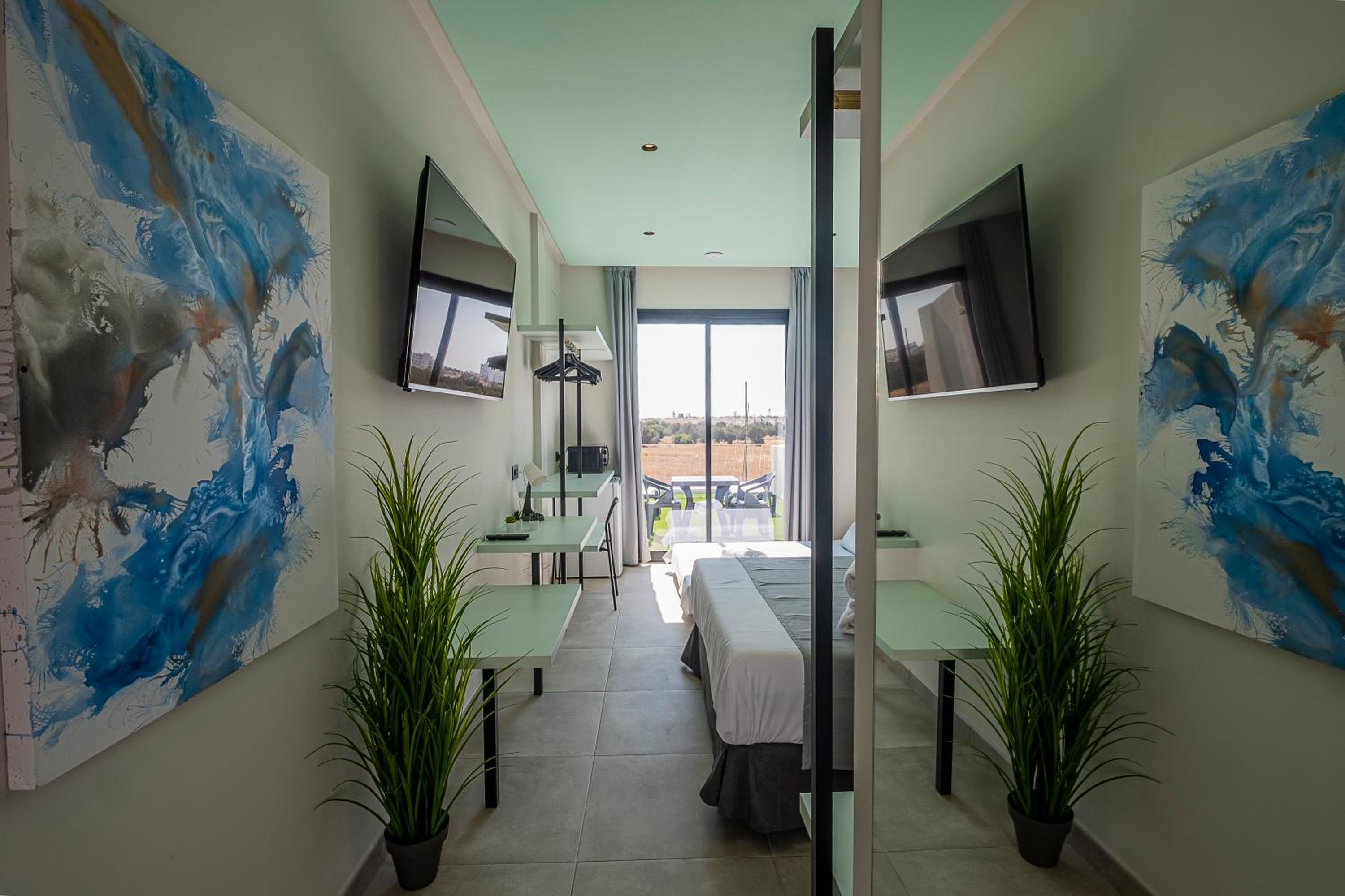 Double Room with Extra Bed (2 Adults + 1 Child)