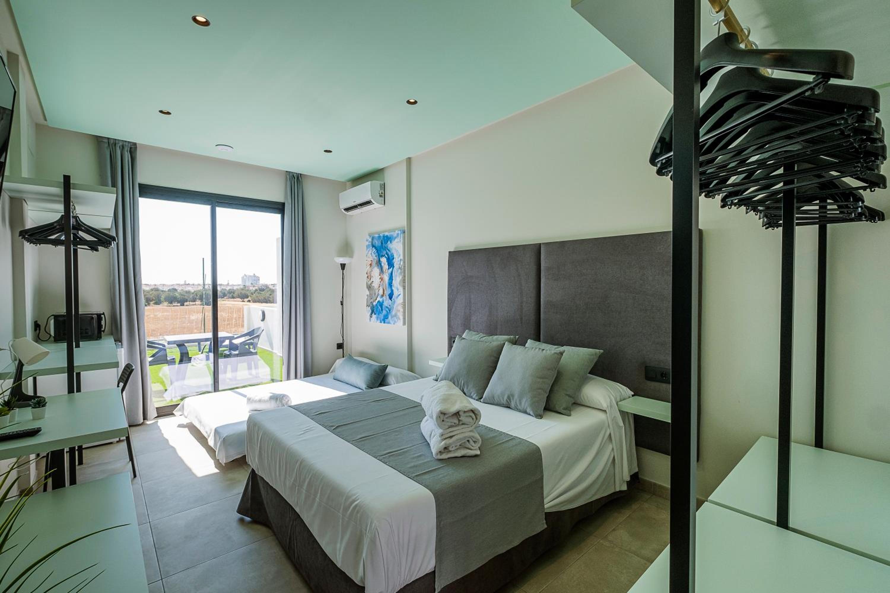 Double Room with Extra Bed (2 Adults + 1 Child) thumbnail 5