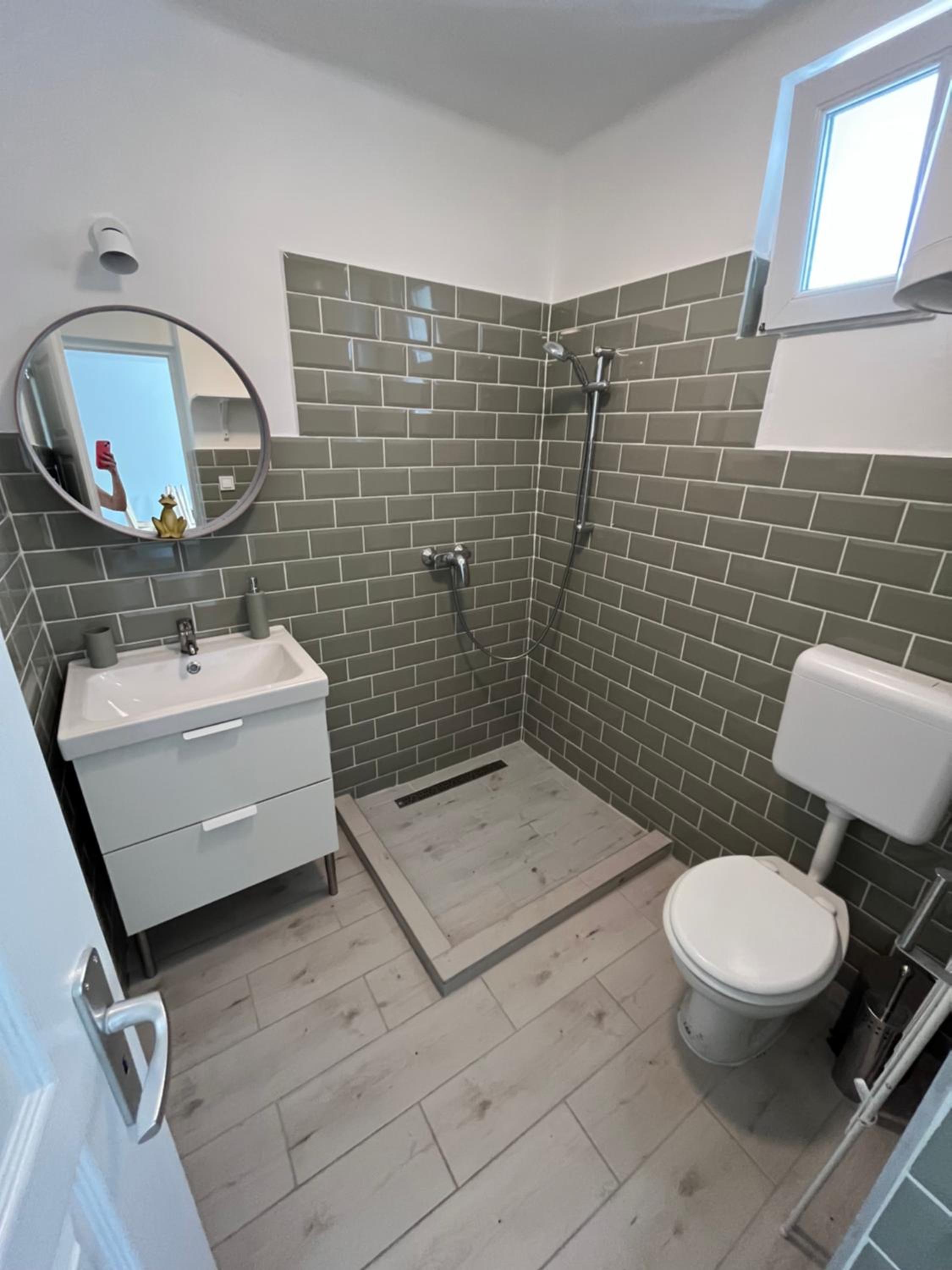 Three-Bedroom Apartment - Photo 25