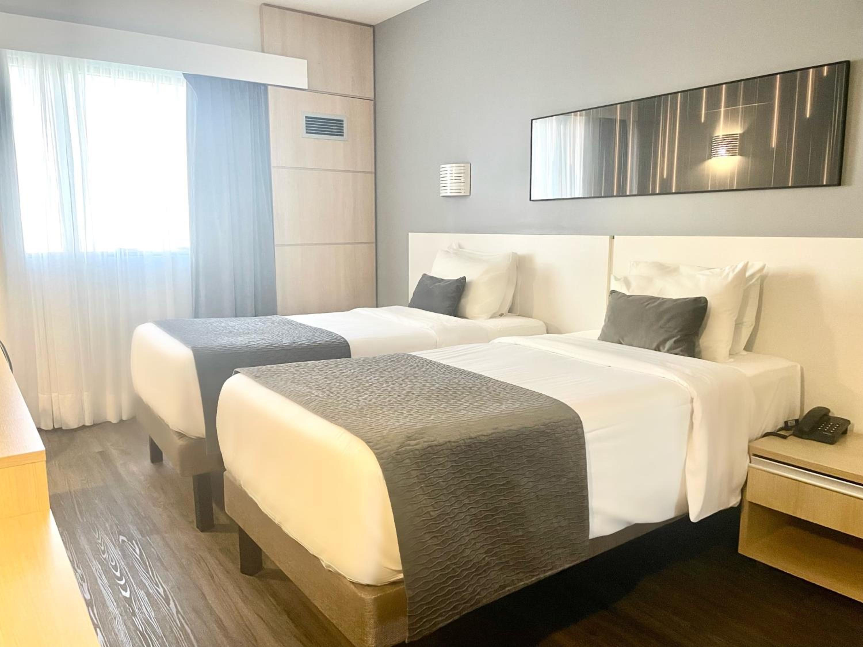Standard Twin Room - Photo 1