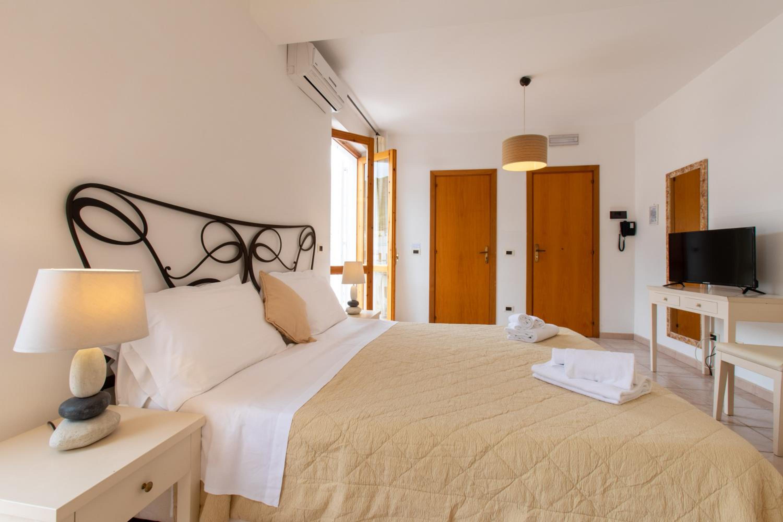 Quadruple Room - Photo 1