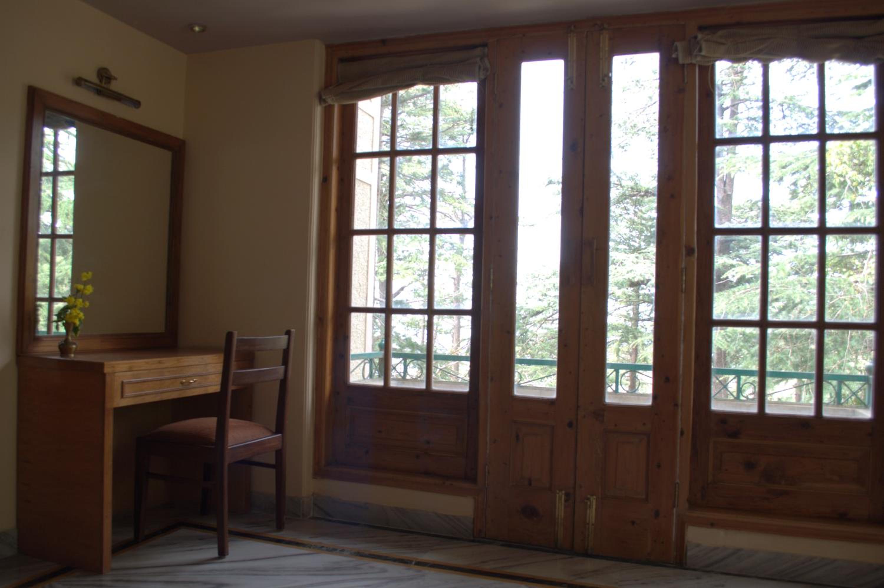 King Suite with Balcony - Photo 2