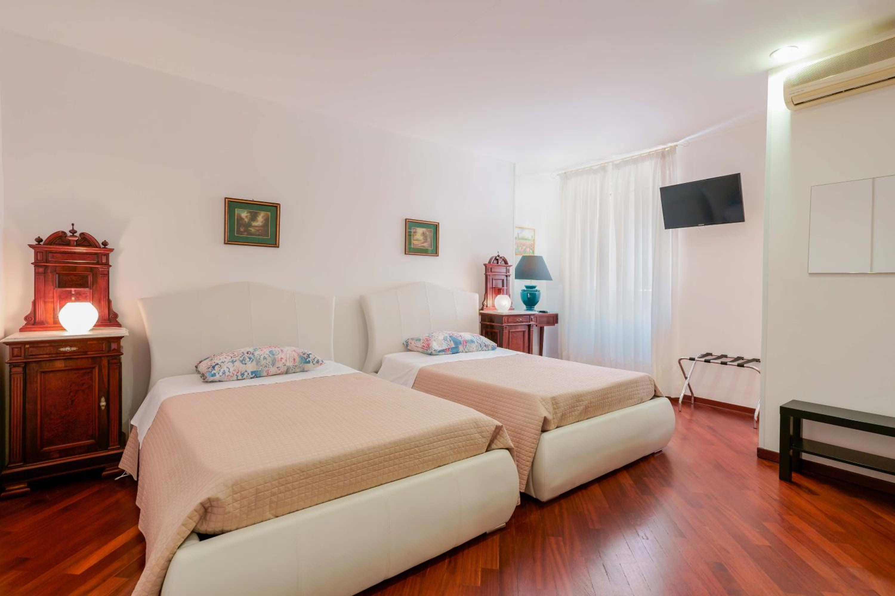 Deluxe Queen Room with Two Queen Beds - Photo 1