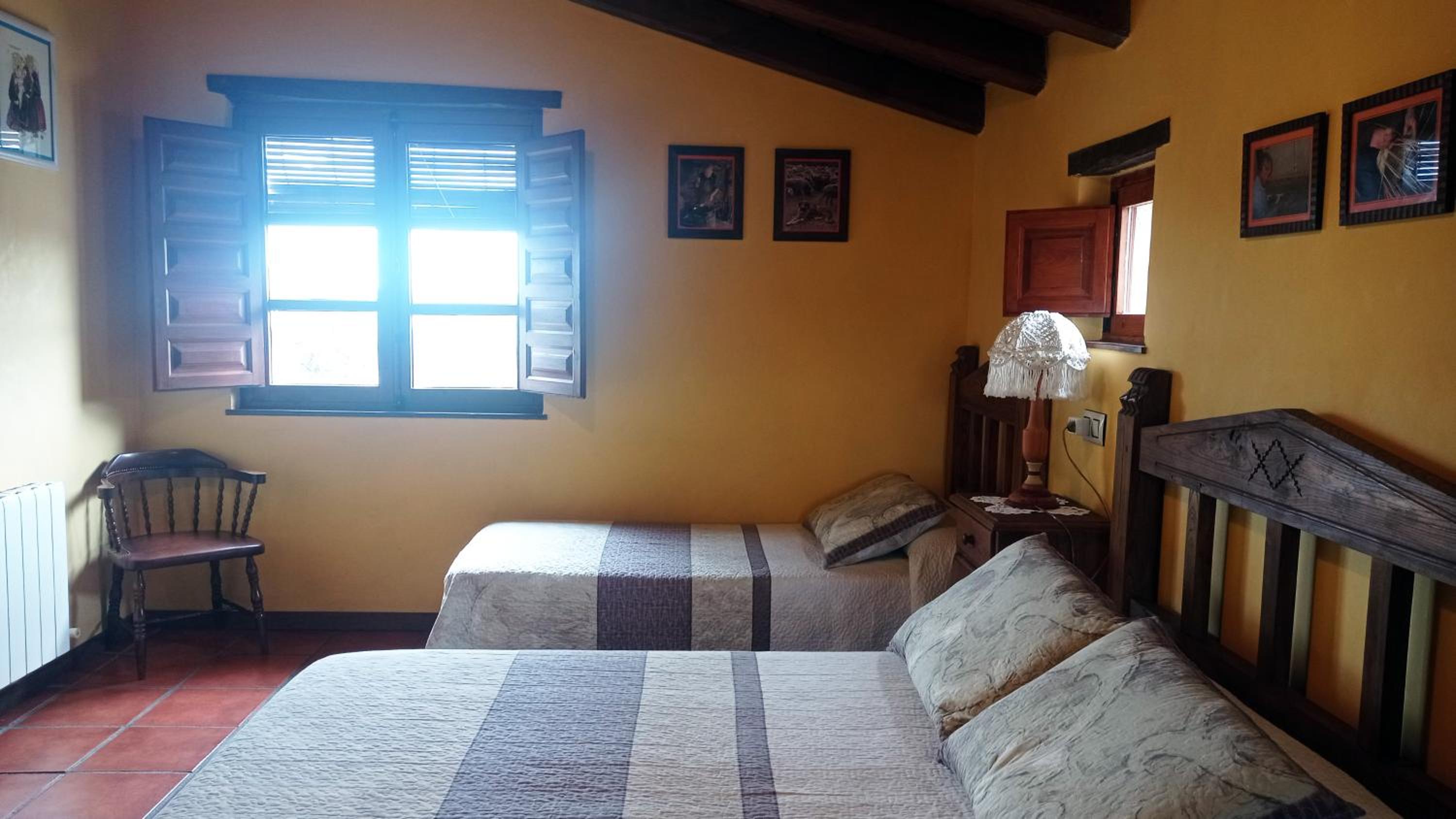 Habitación triple con baño