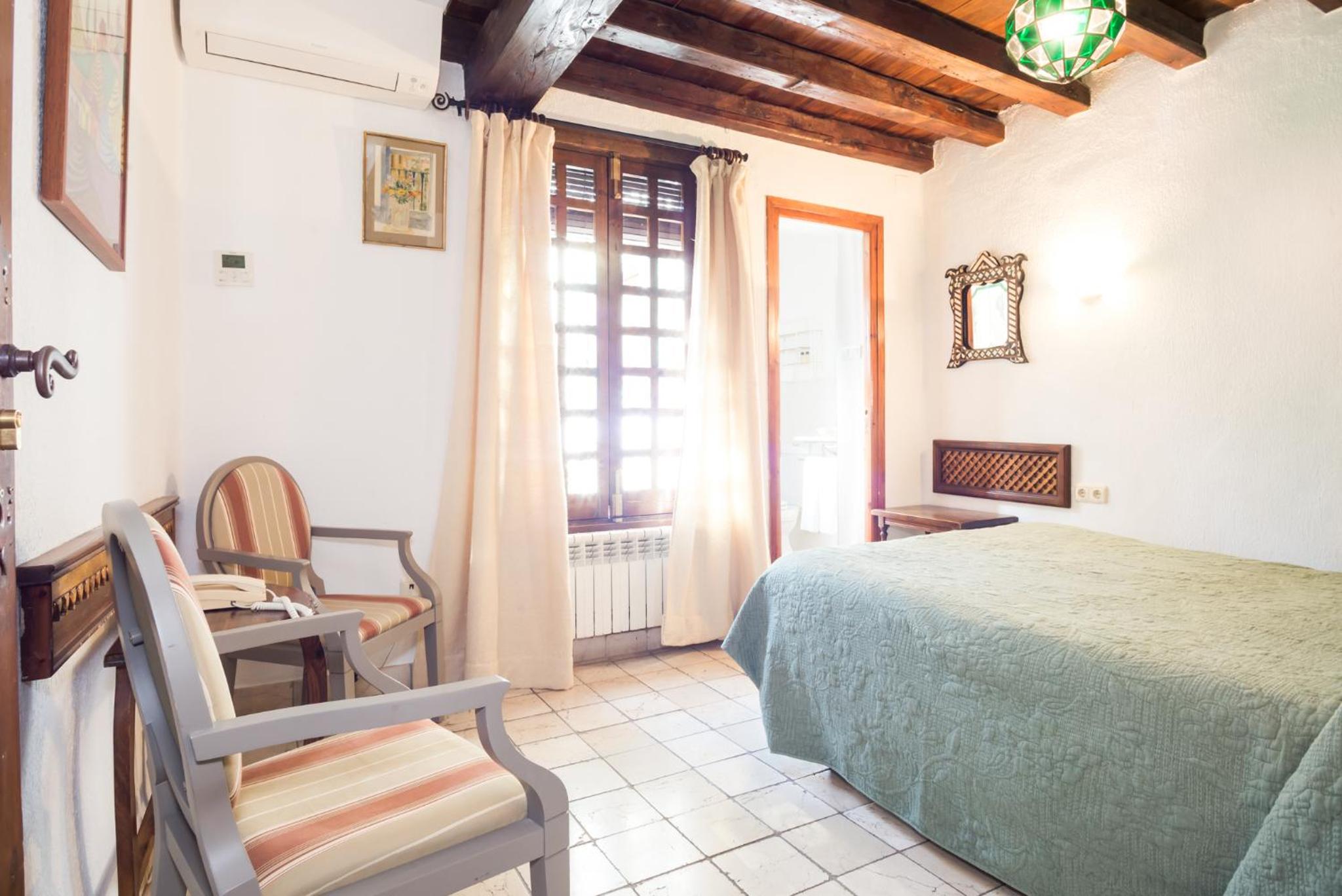 Habitación Doble Estándar o con Dos Camas Individuales.