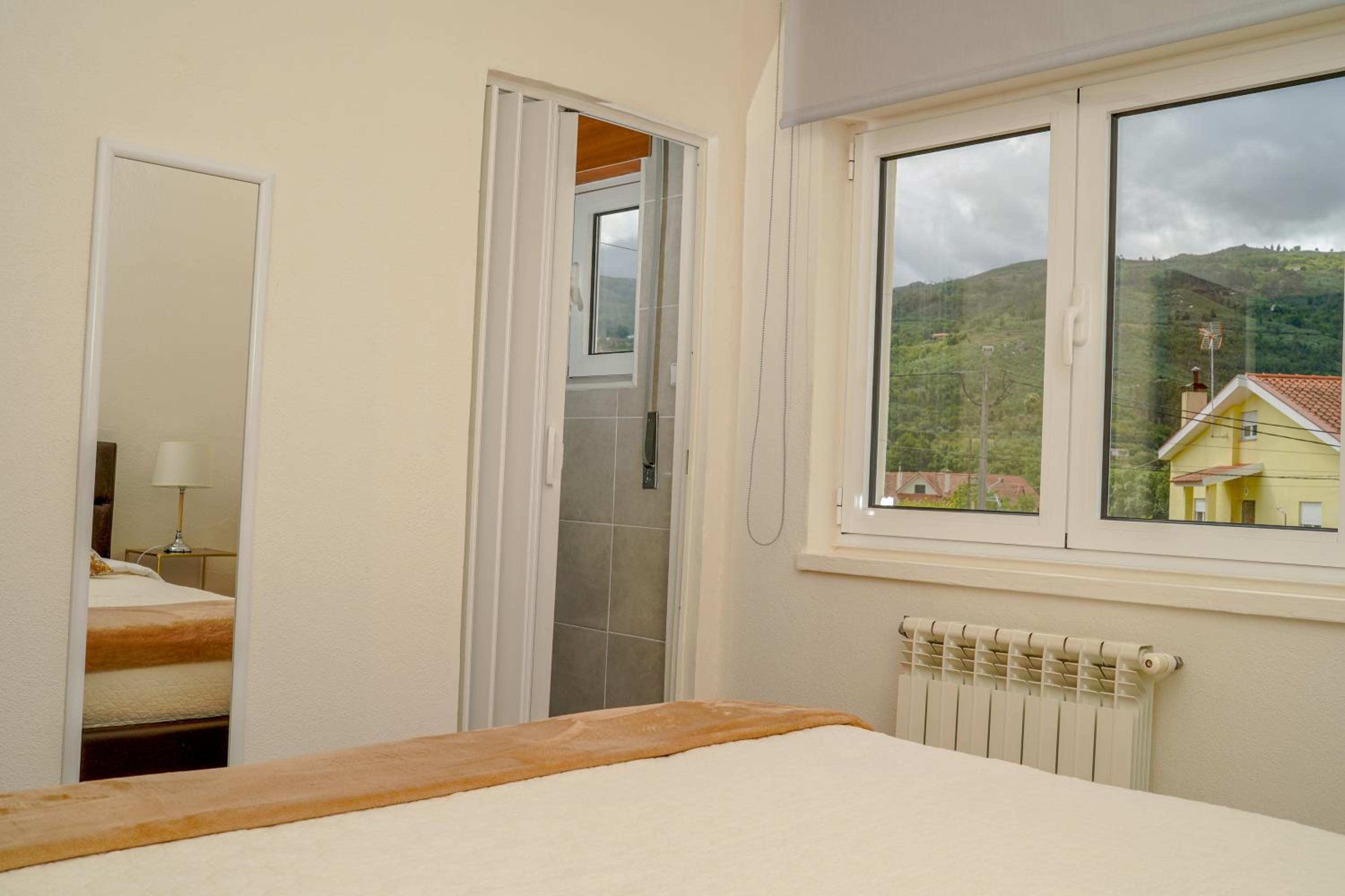 Three-Bedroom House - Photo 20