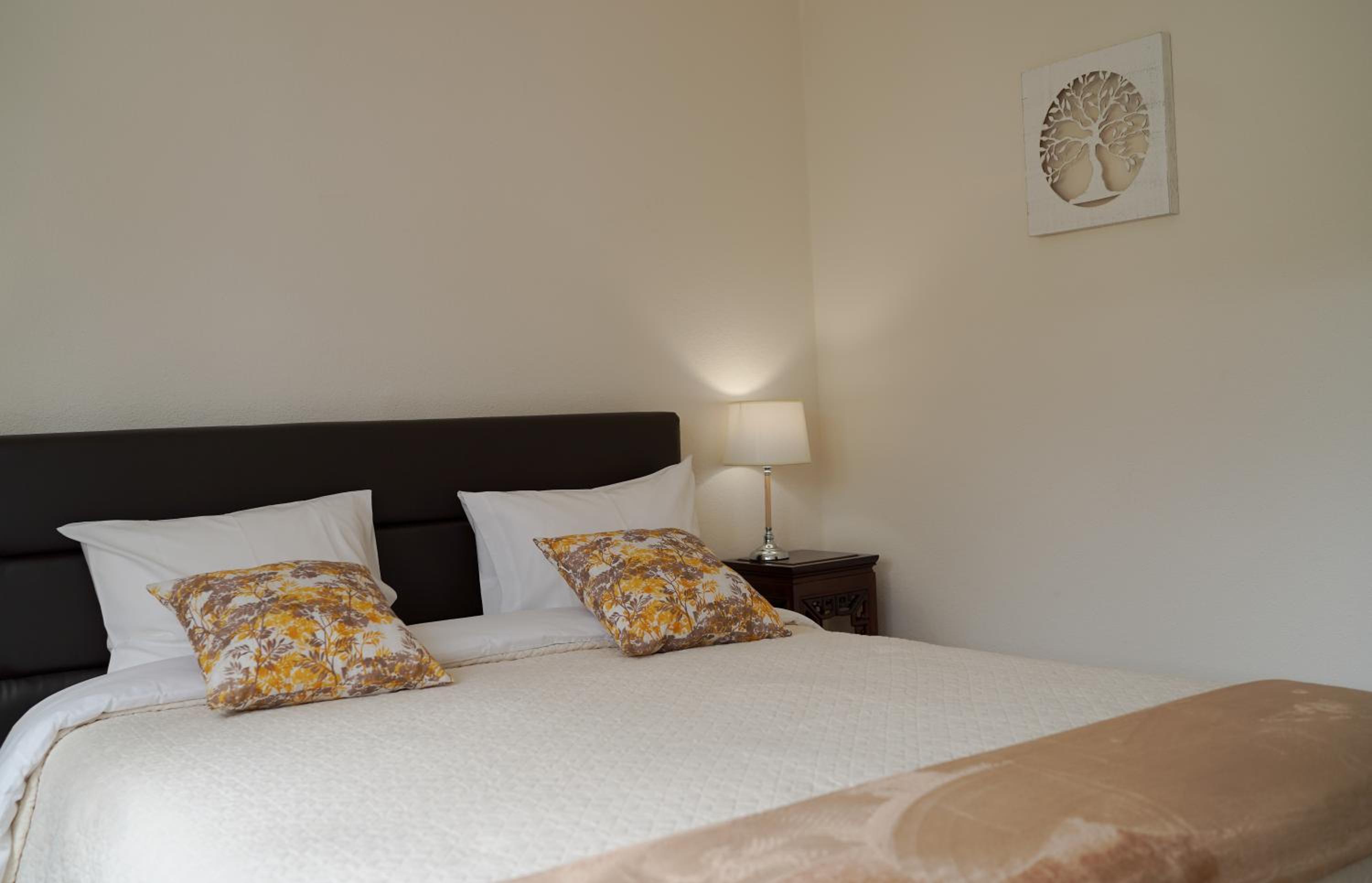 Three-Bedroom House - Photo 19