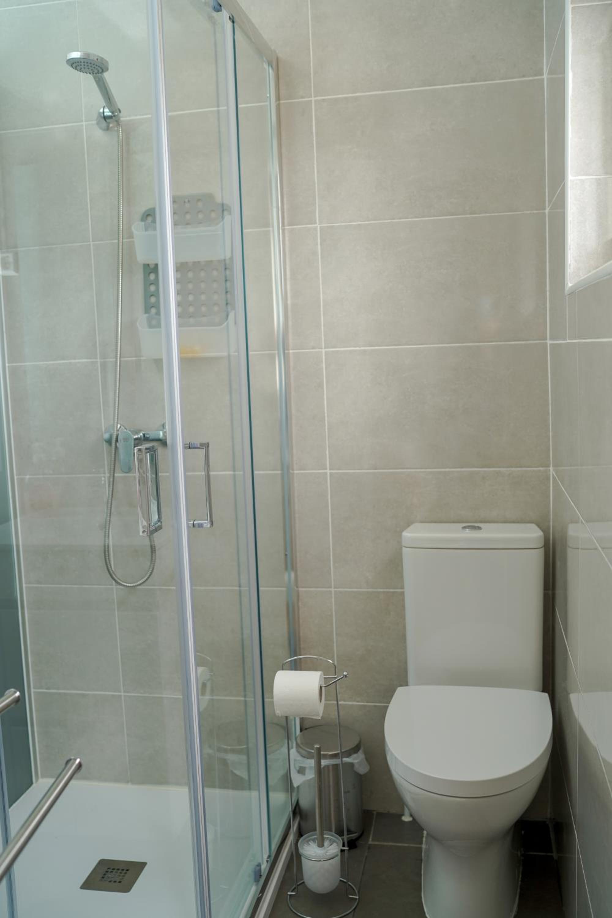 Three-Bedroom House - Photo 18