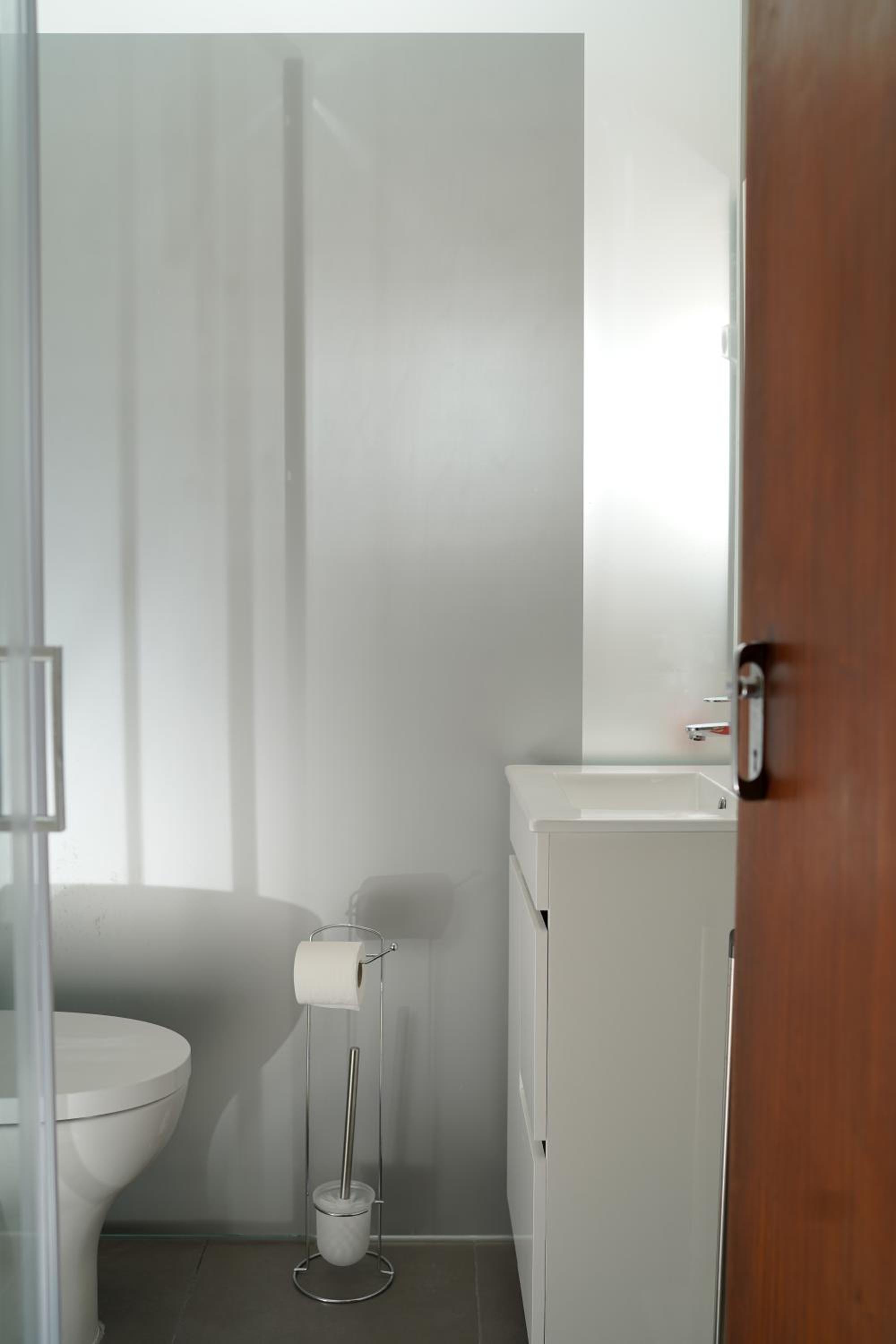 Three-Bedroom House - Photo 17