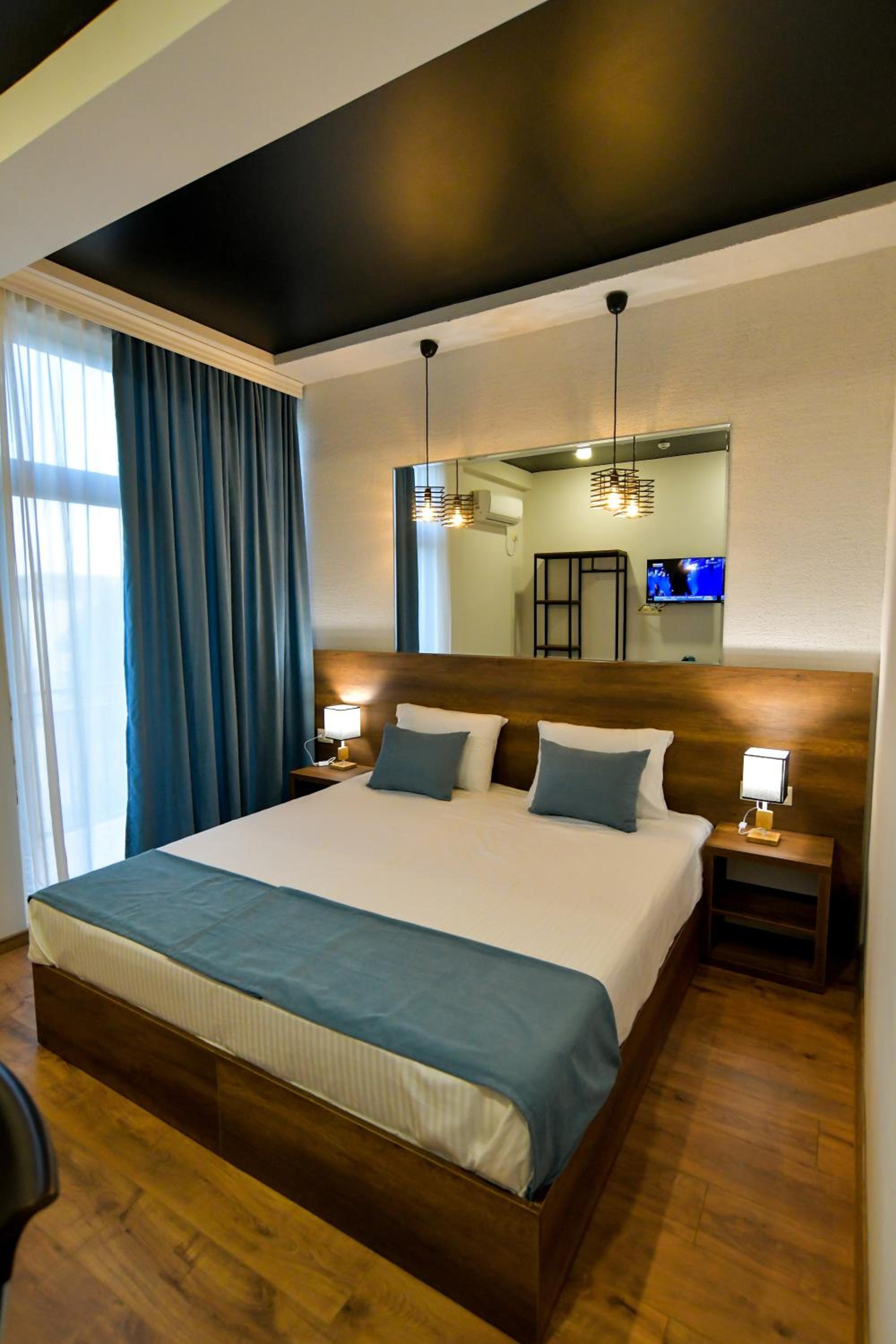 Double Room with Balcony (2 Adults + 1 Child)