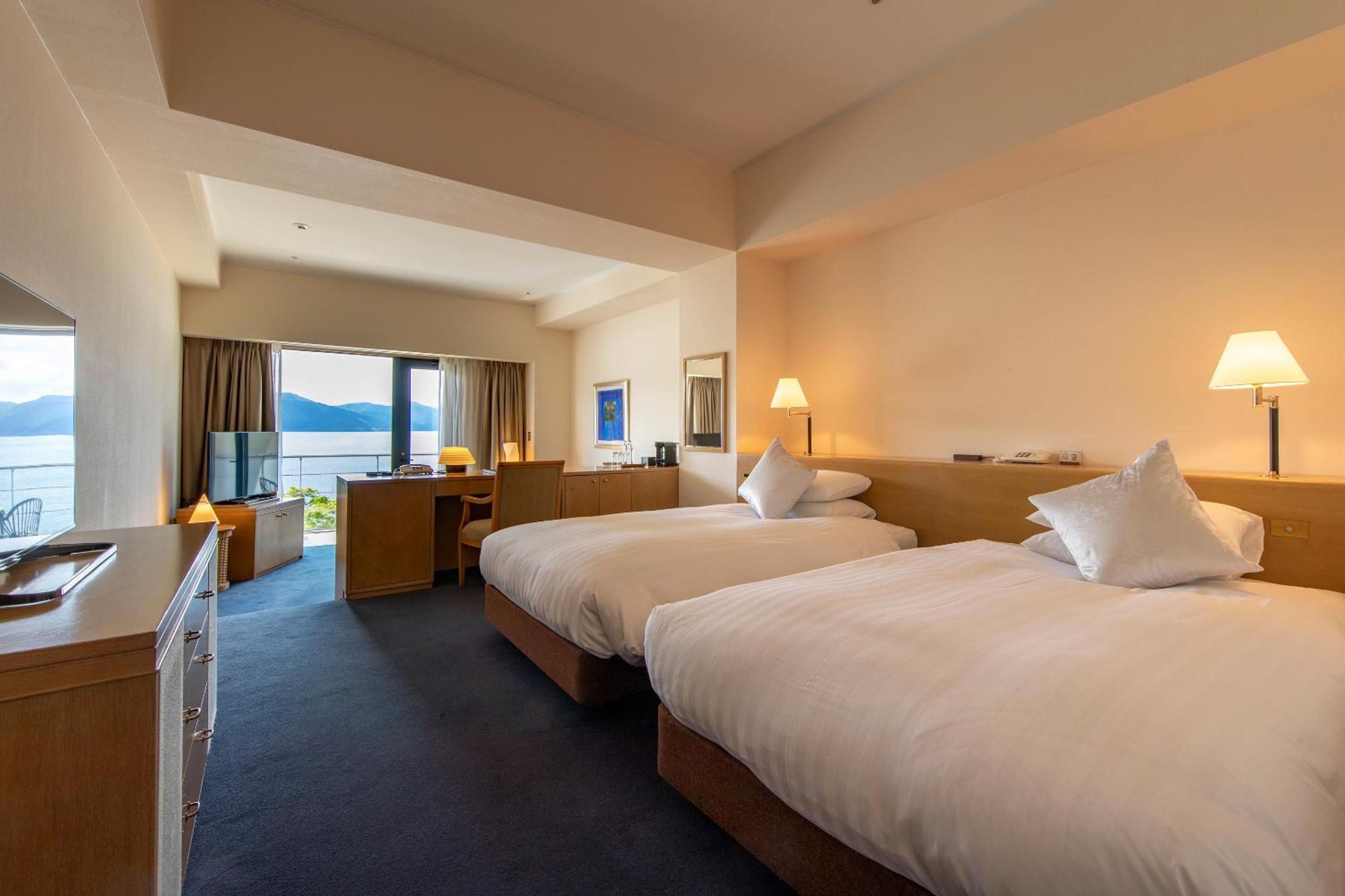 Junior Suite with Balcony and Lake View - Photo 1