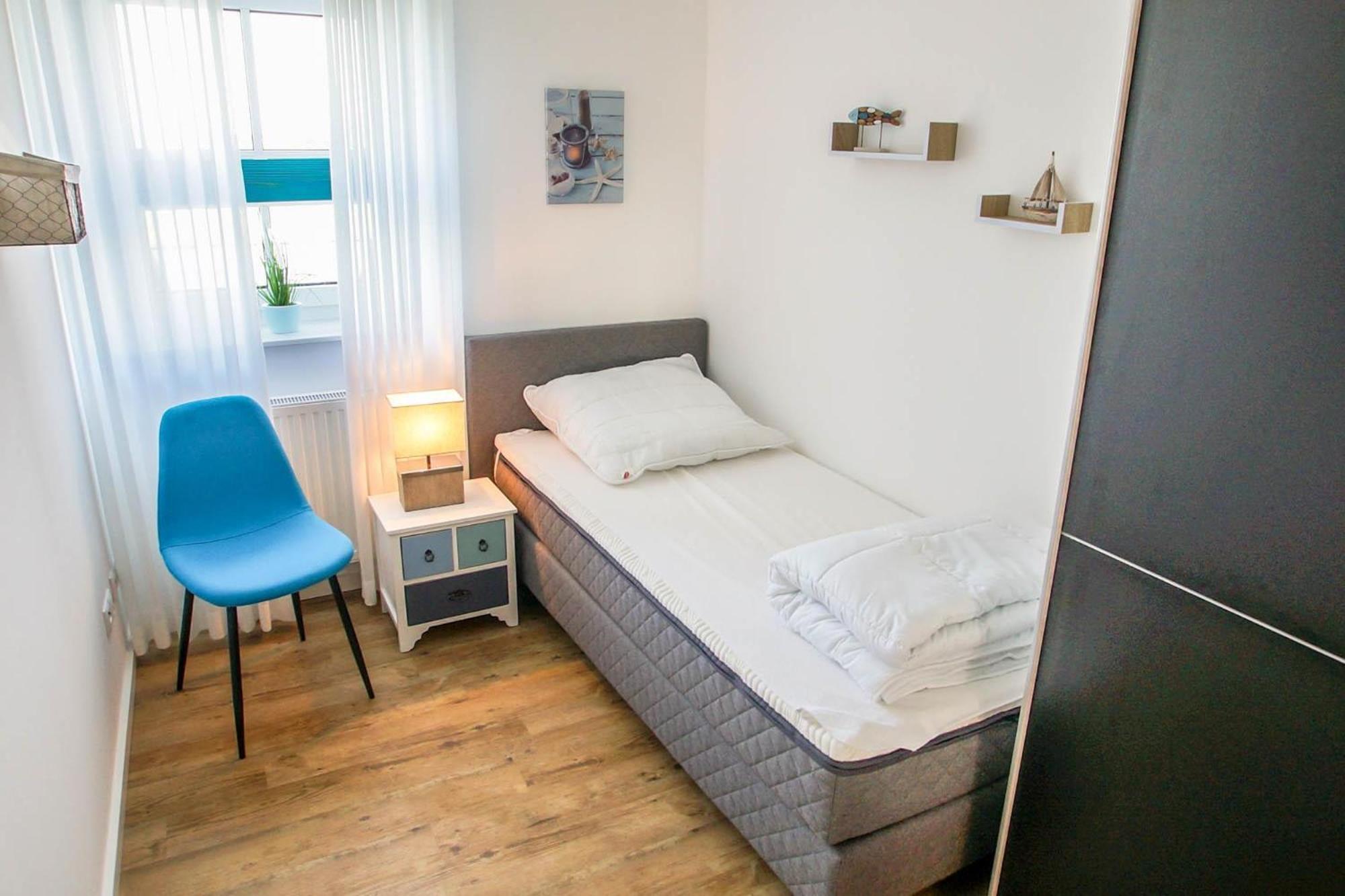 Three-Bedroom Apartment photo 1