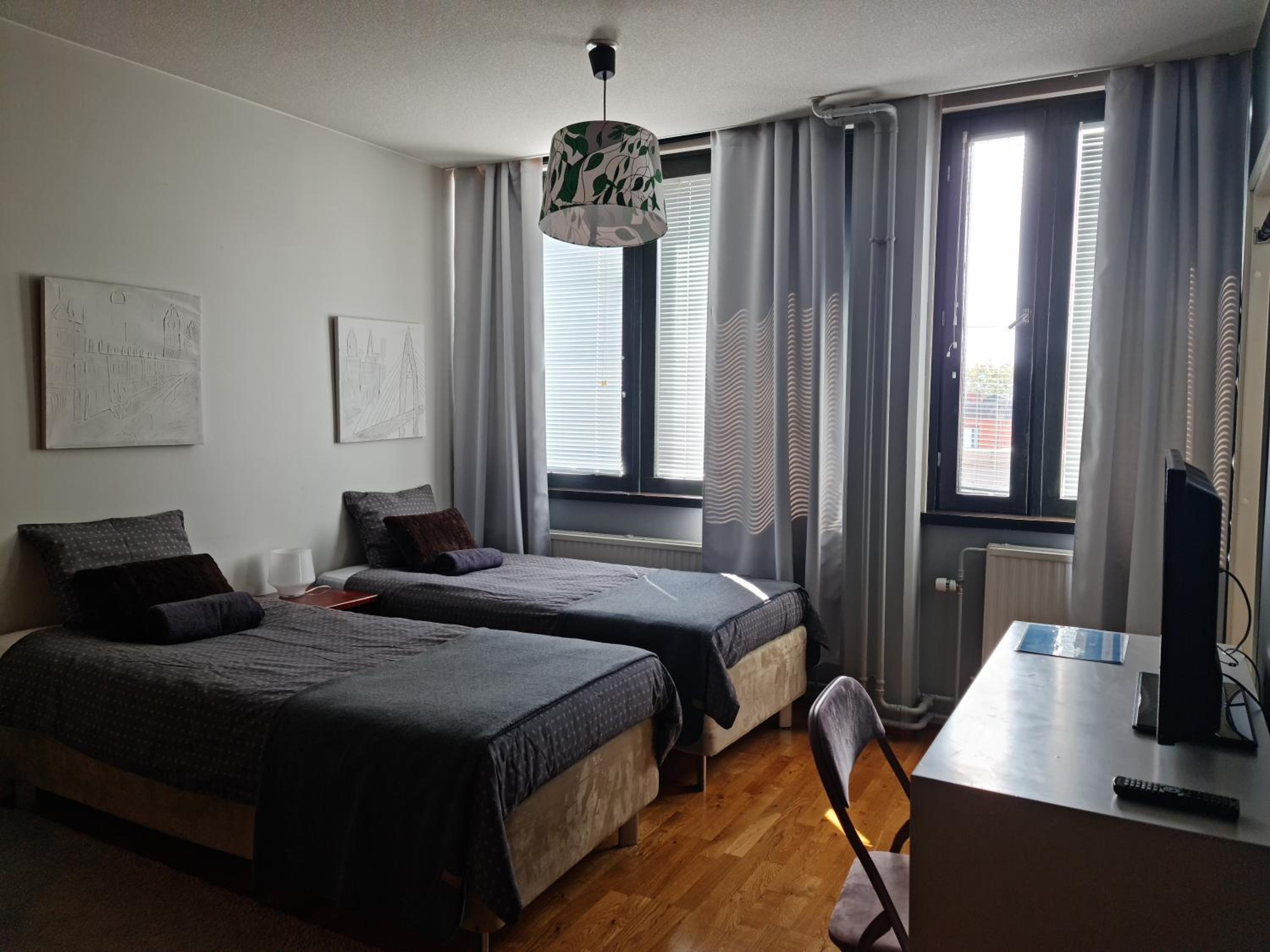 Three-Bedroom Apartment - Photo 11