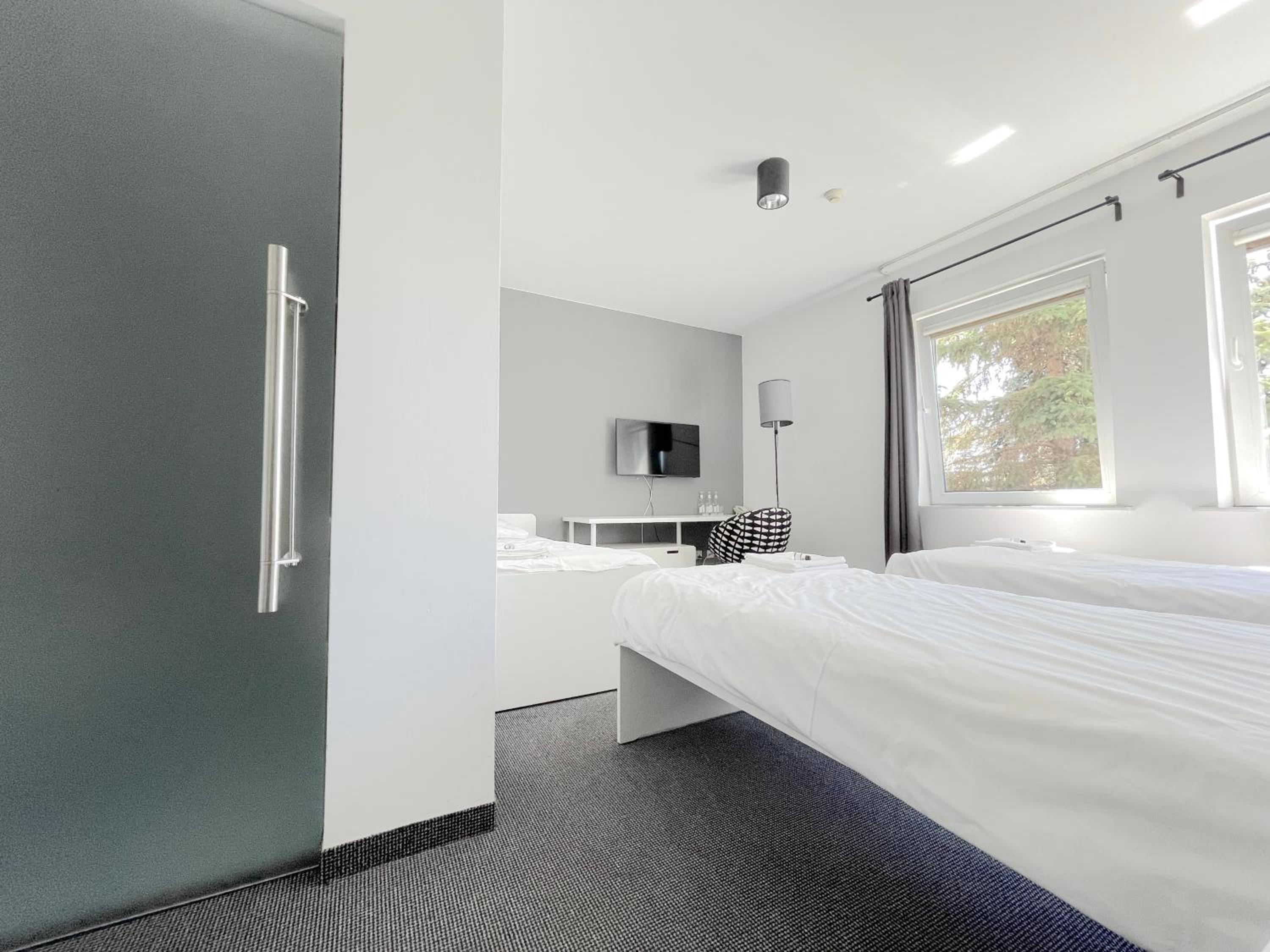 Triple Room - Photo 1