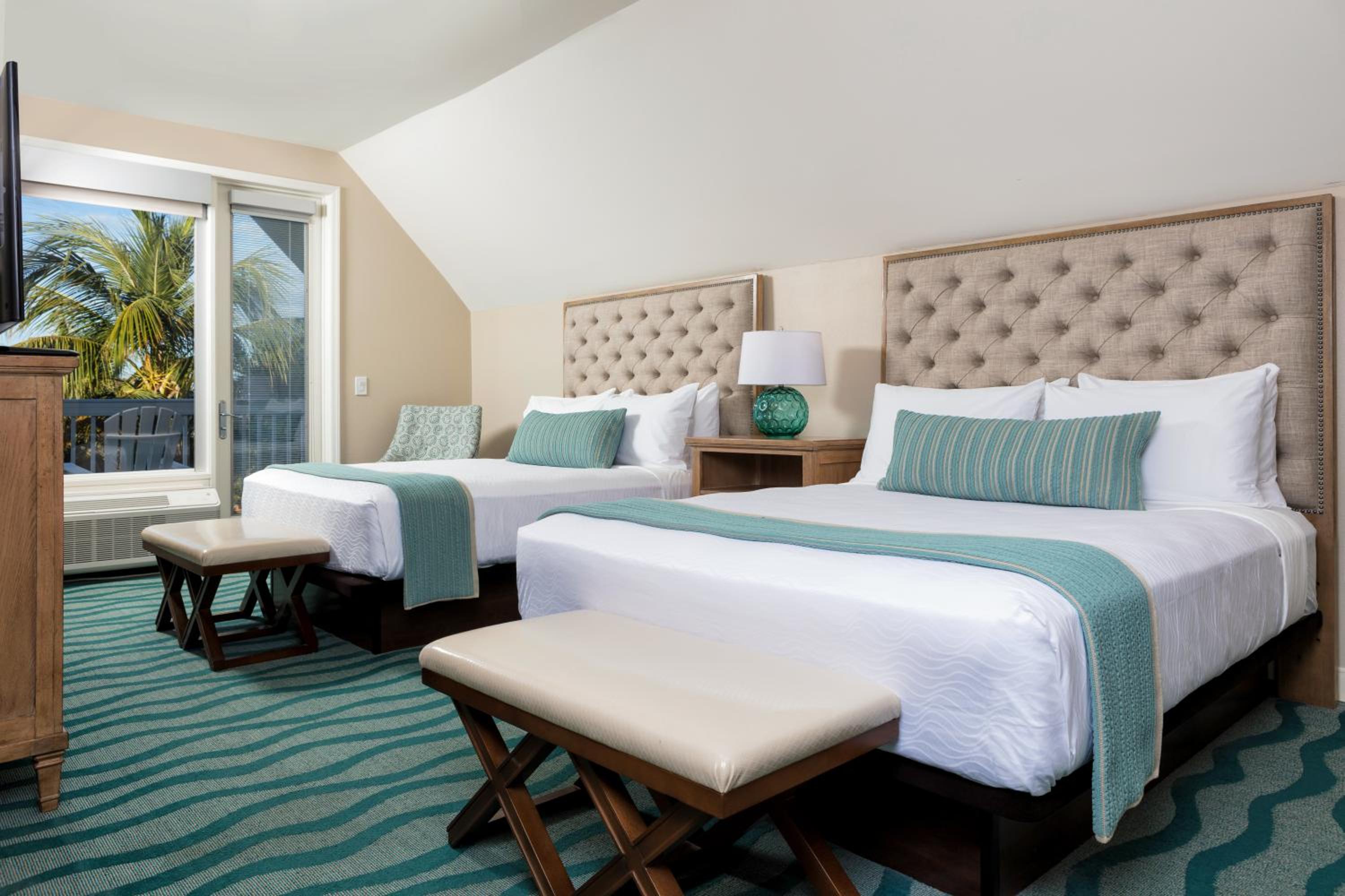 Two Bedroom - One King -Two Queens Suite Pool View