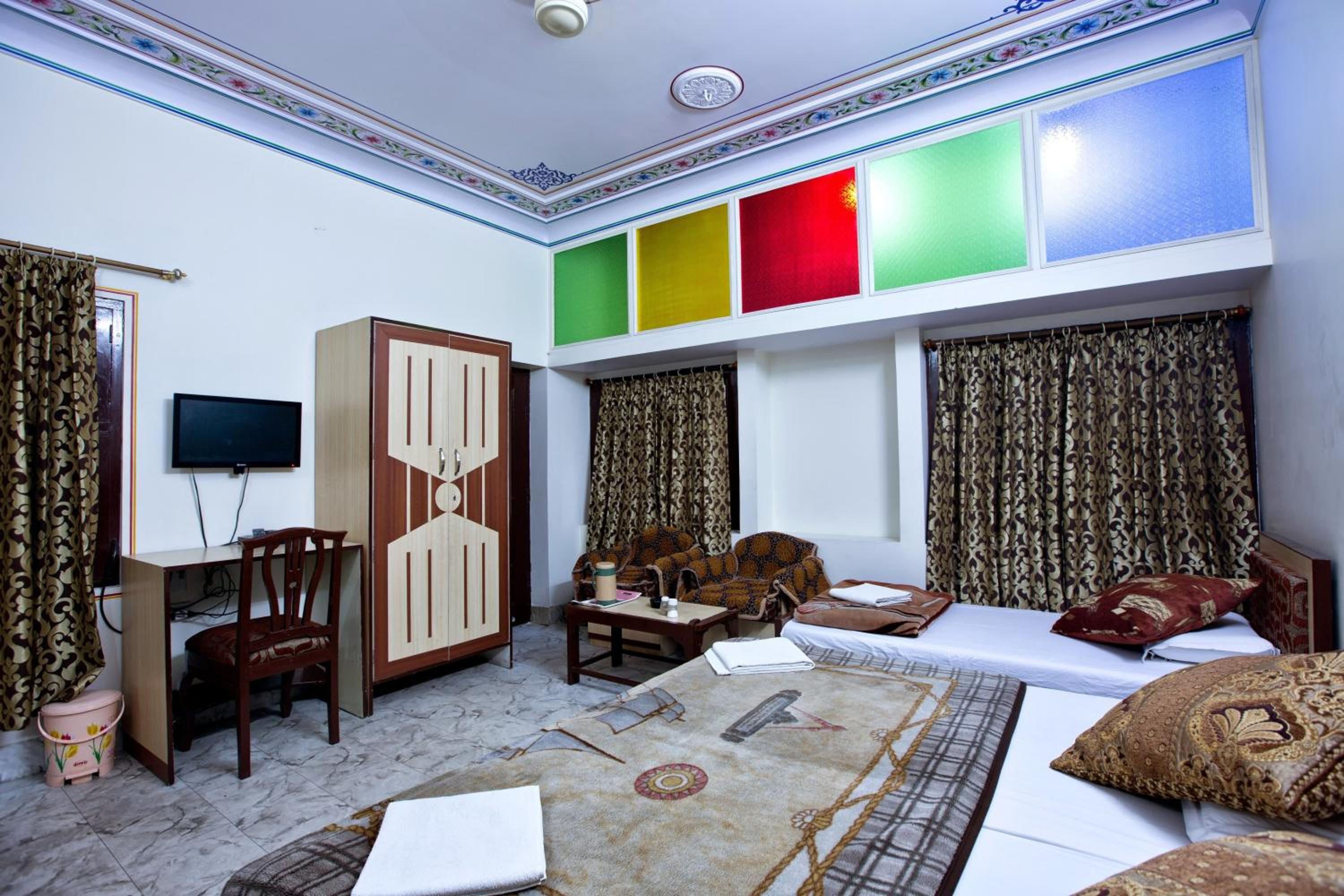 Standard Triple Room with Fan - 10% off on SURA Cocktails & Cuisines, Enjoy Live Music, Welcome Drink on Arrival and Free Pickup from Railway Station - Photo 1