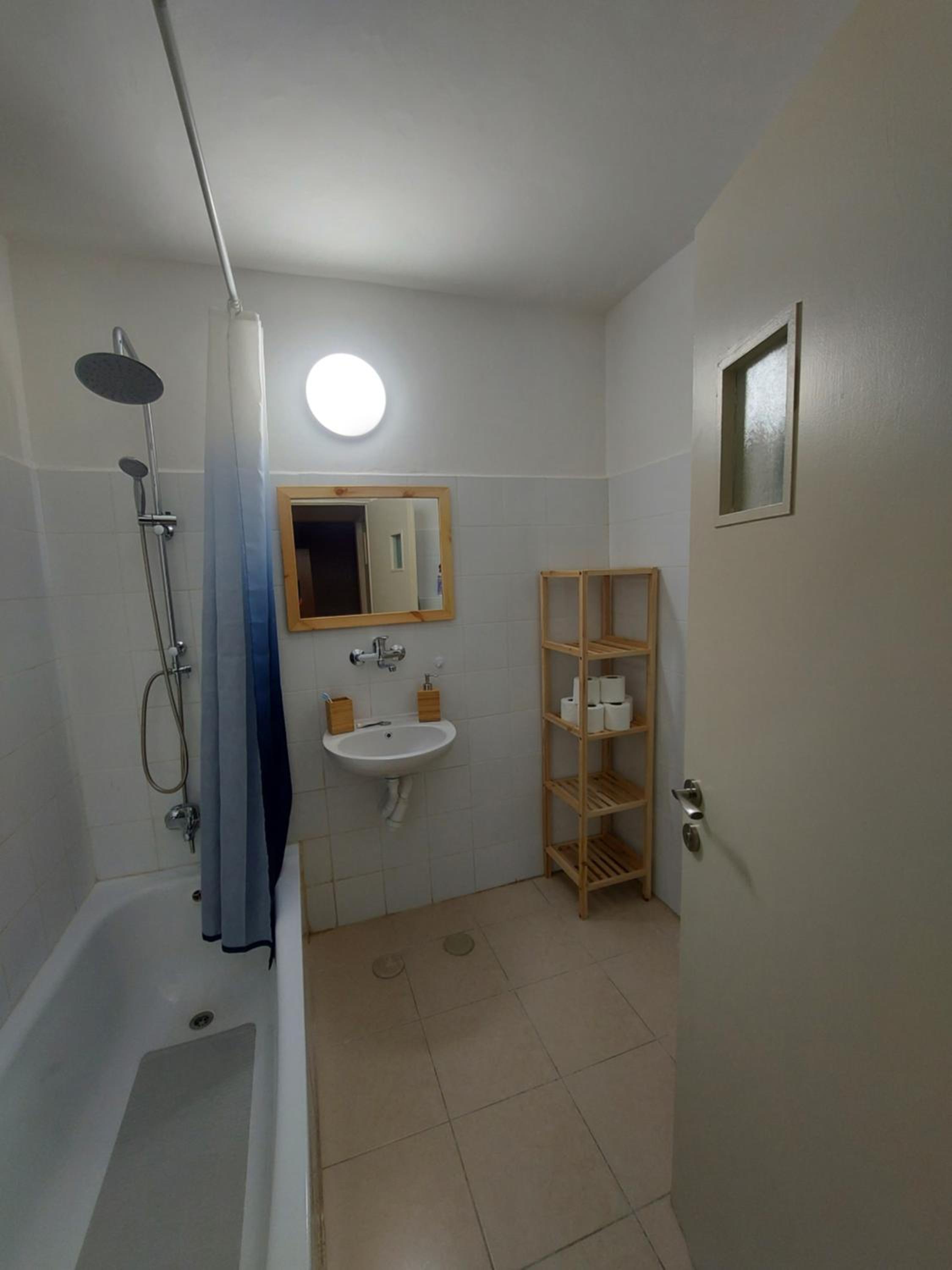 Three-Bedroom Apartment - Photo 12