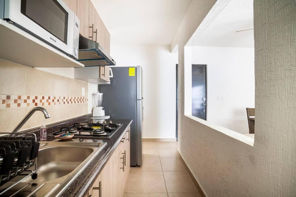 Three-Bedroom Apartment - Photo 9