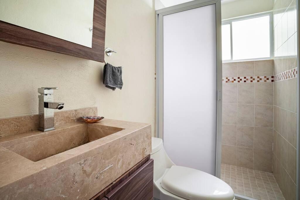 Three-Bedroom Apartment - Photo 46