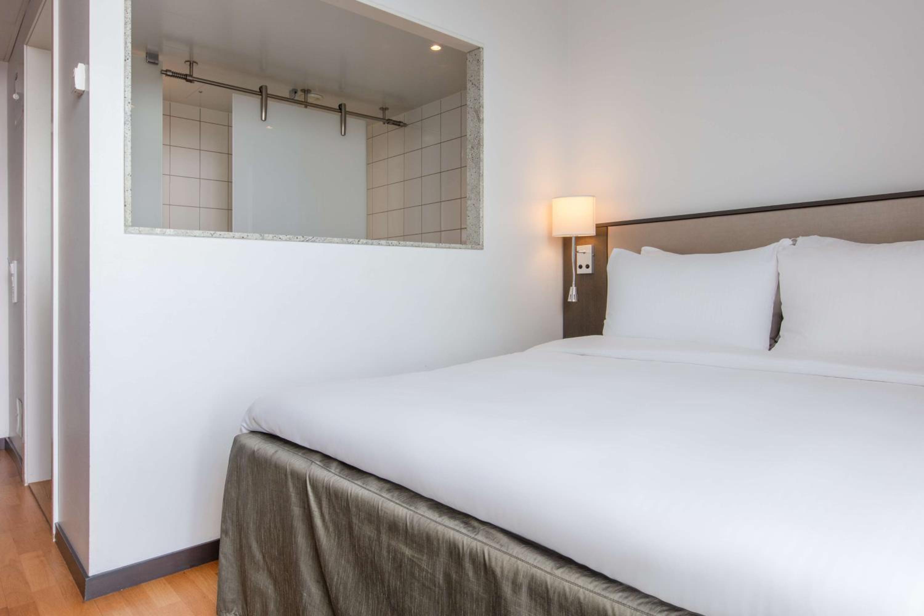 Standard Room with City View and Balcony - Photo 6