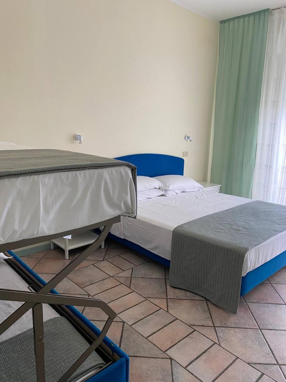 Comfort Quadruple Room with Balcony - Photo 1
