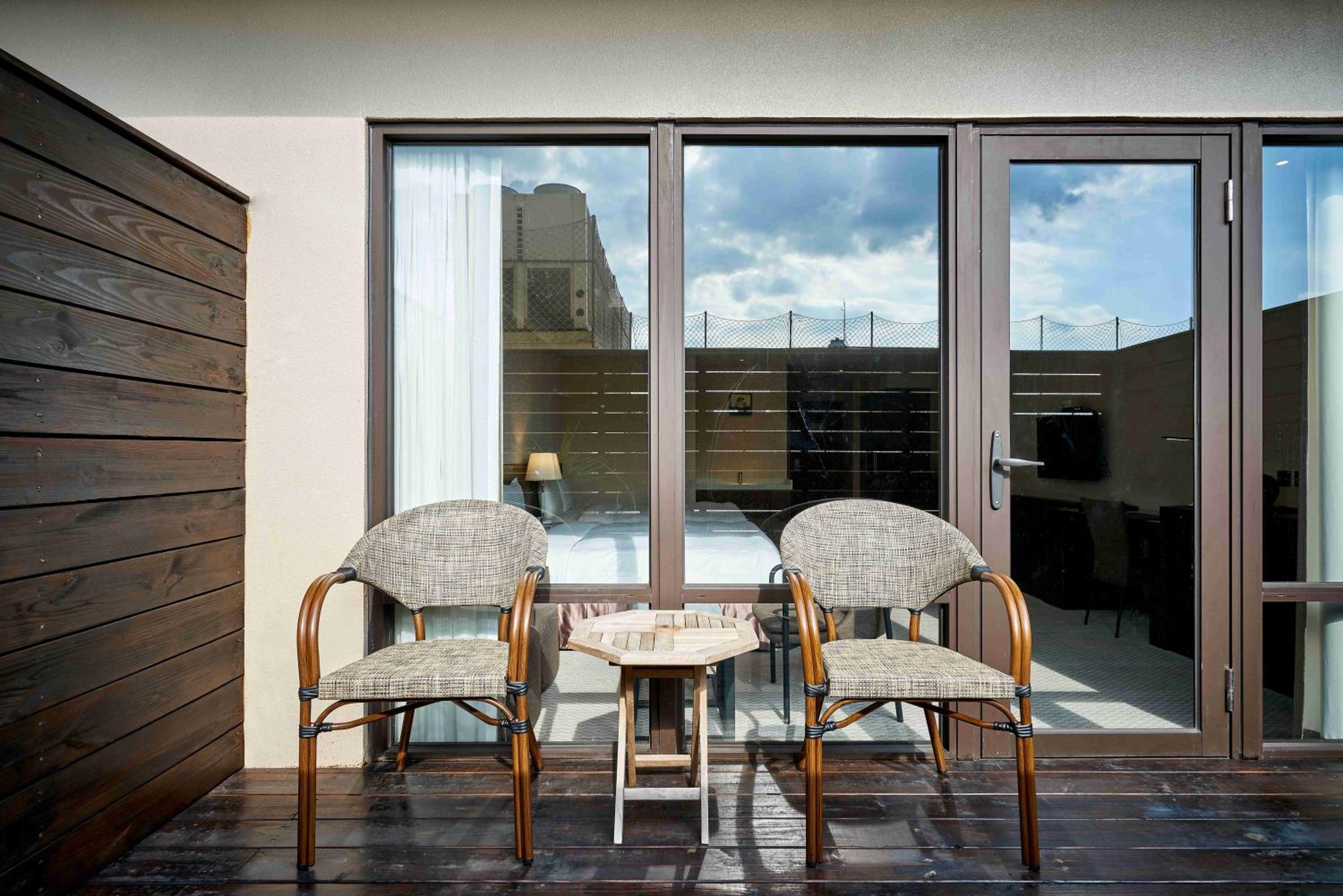 Deluxe Quadruple Room with Balcony