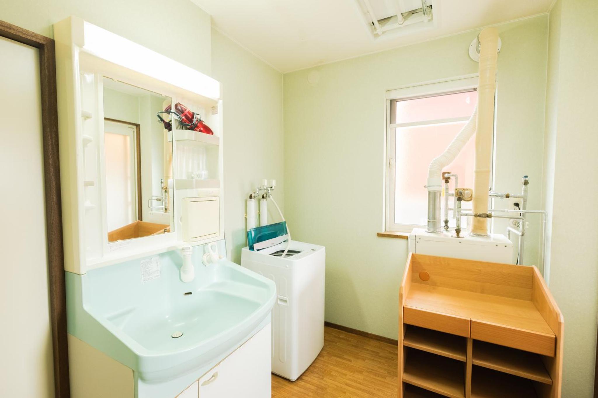 Four-Bedroom House - Photo 20