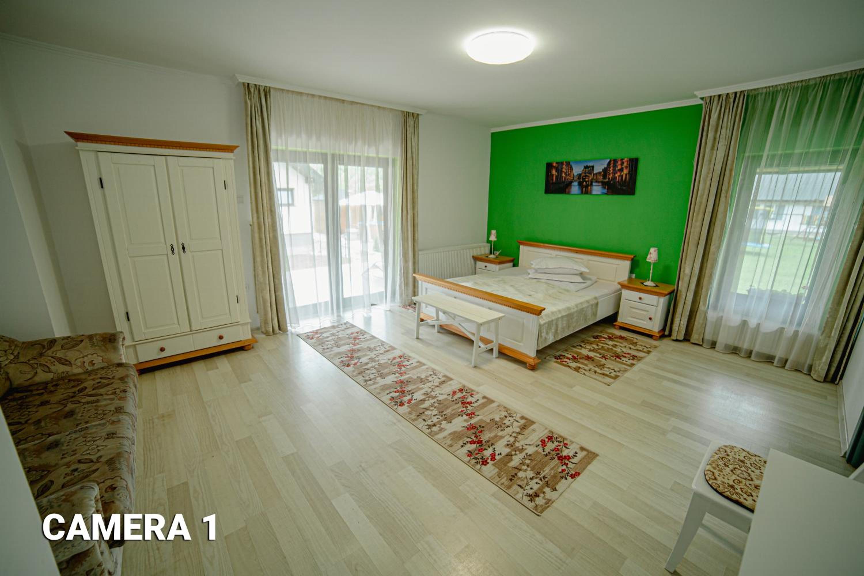 Deluxe Room (2 Adults + 1 Child) - Photo 1
