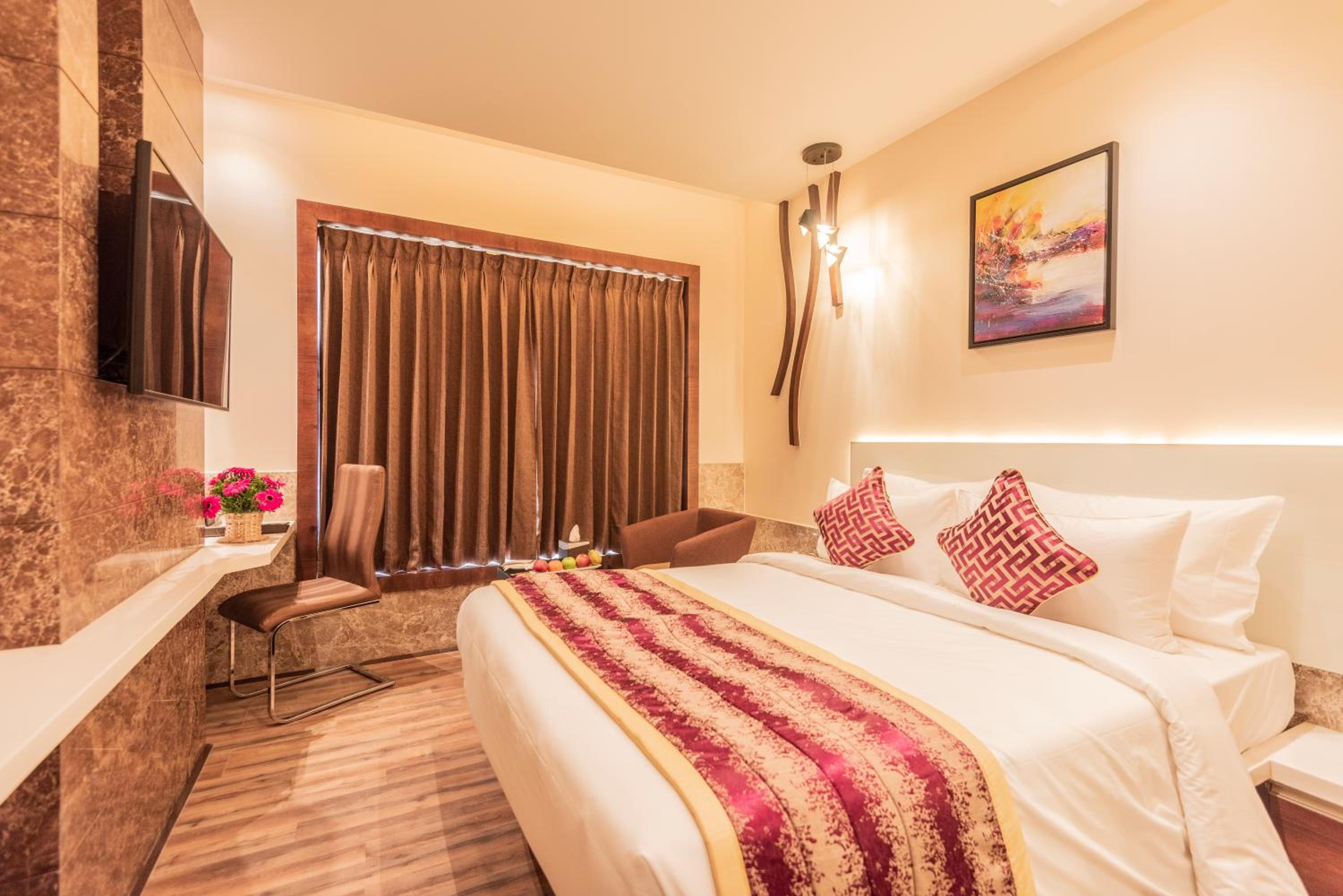 Deluxe Room - Photo 1