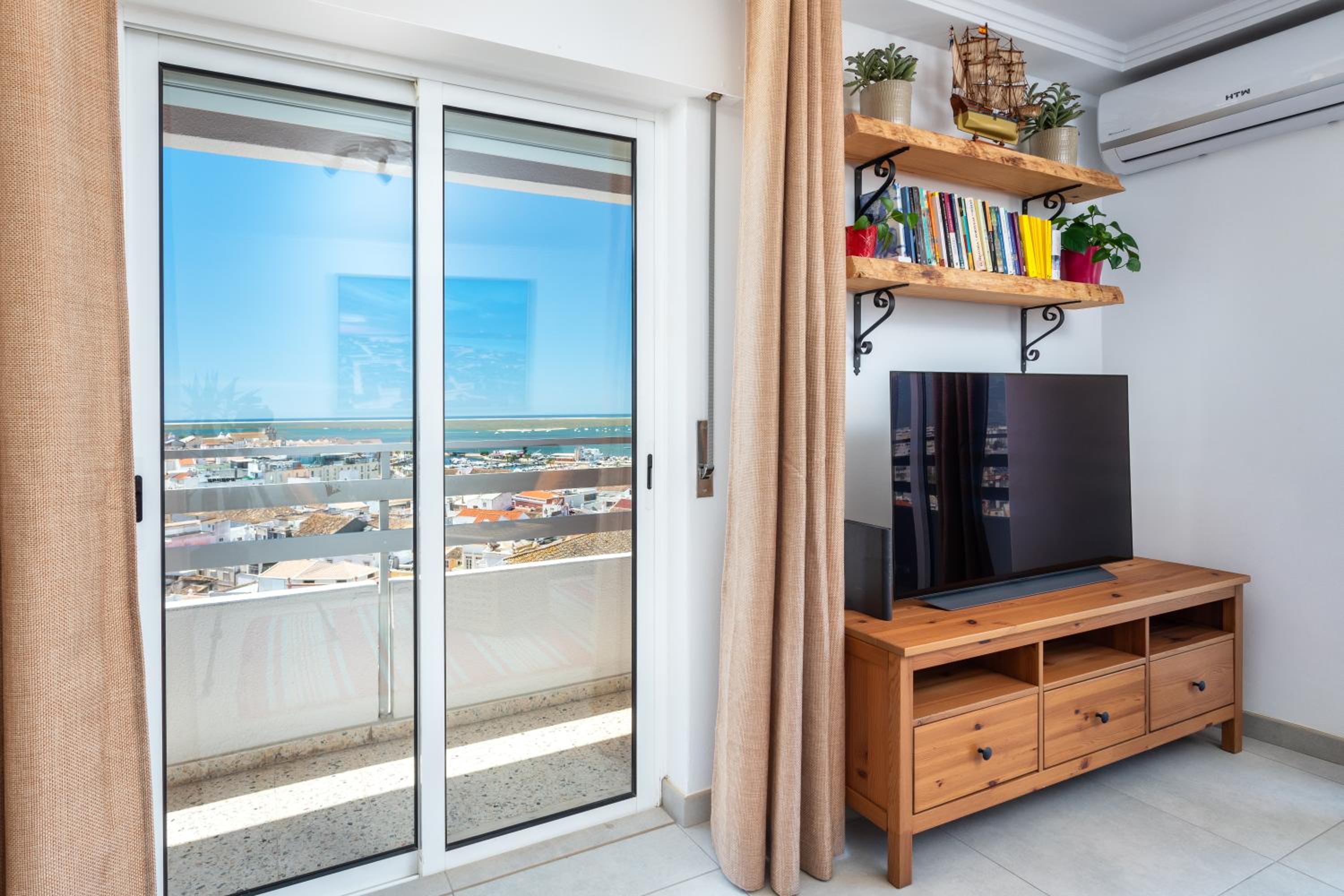 Three-Bedroom Apartment - Photo 22