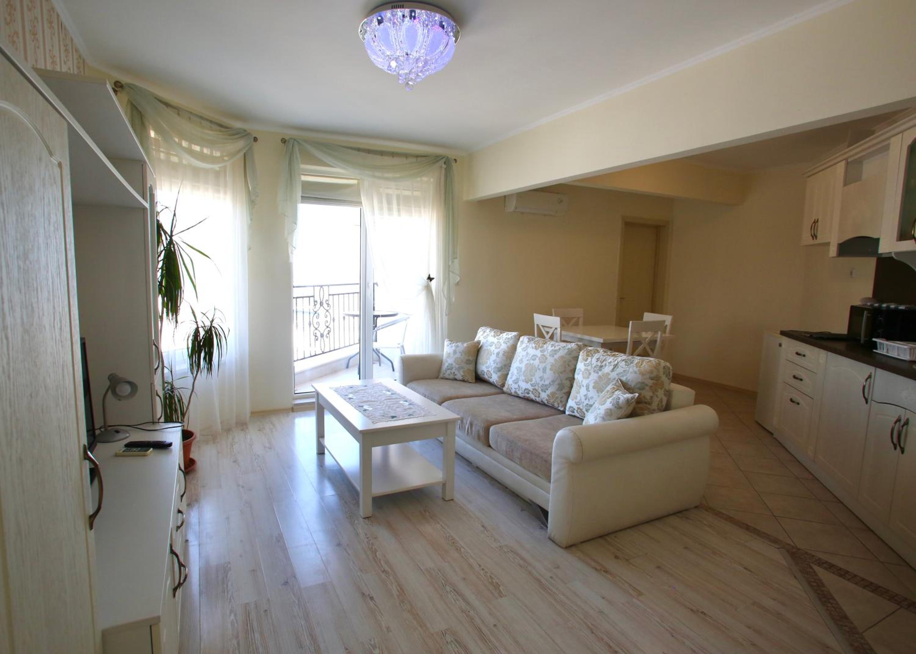 Deluxe Two-Bedroom Apartment with Balcony and Partial Sea View photo 1