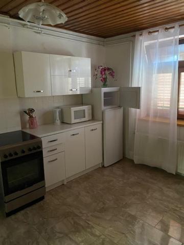Three-Bedroom House - Photo 17