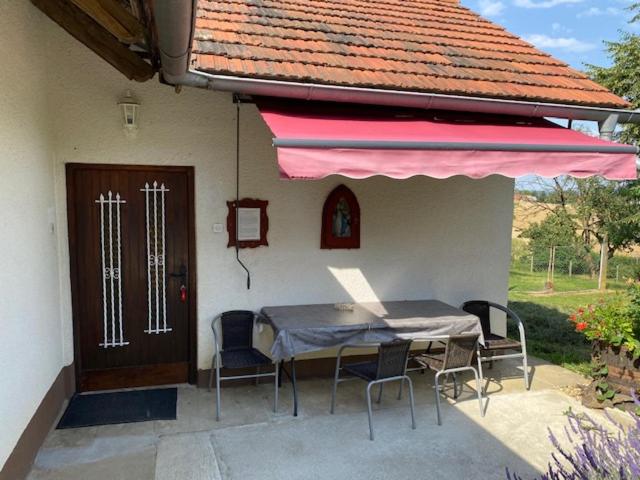 Three-Bedroom House - Photo 25