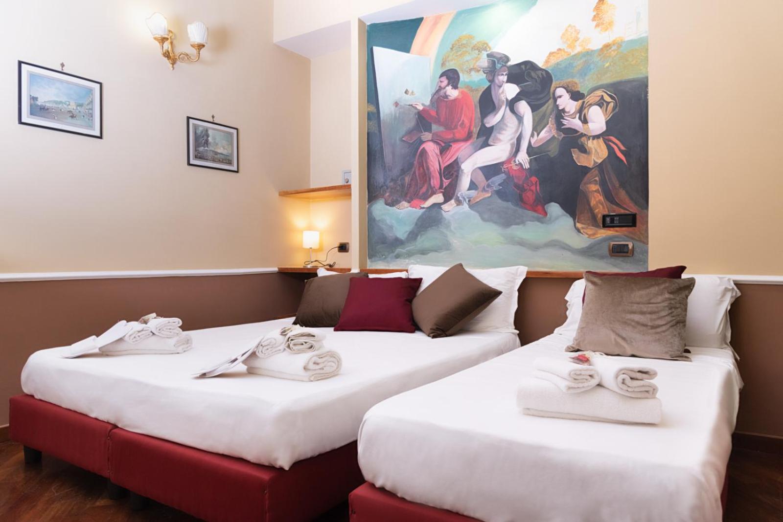Family Room with Two Queen Beds and Single Bed photo 1