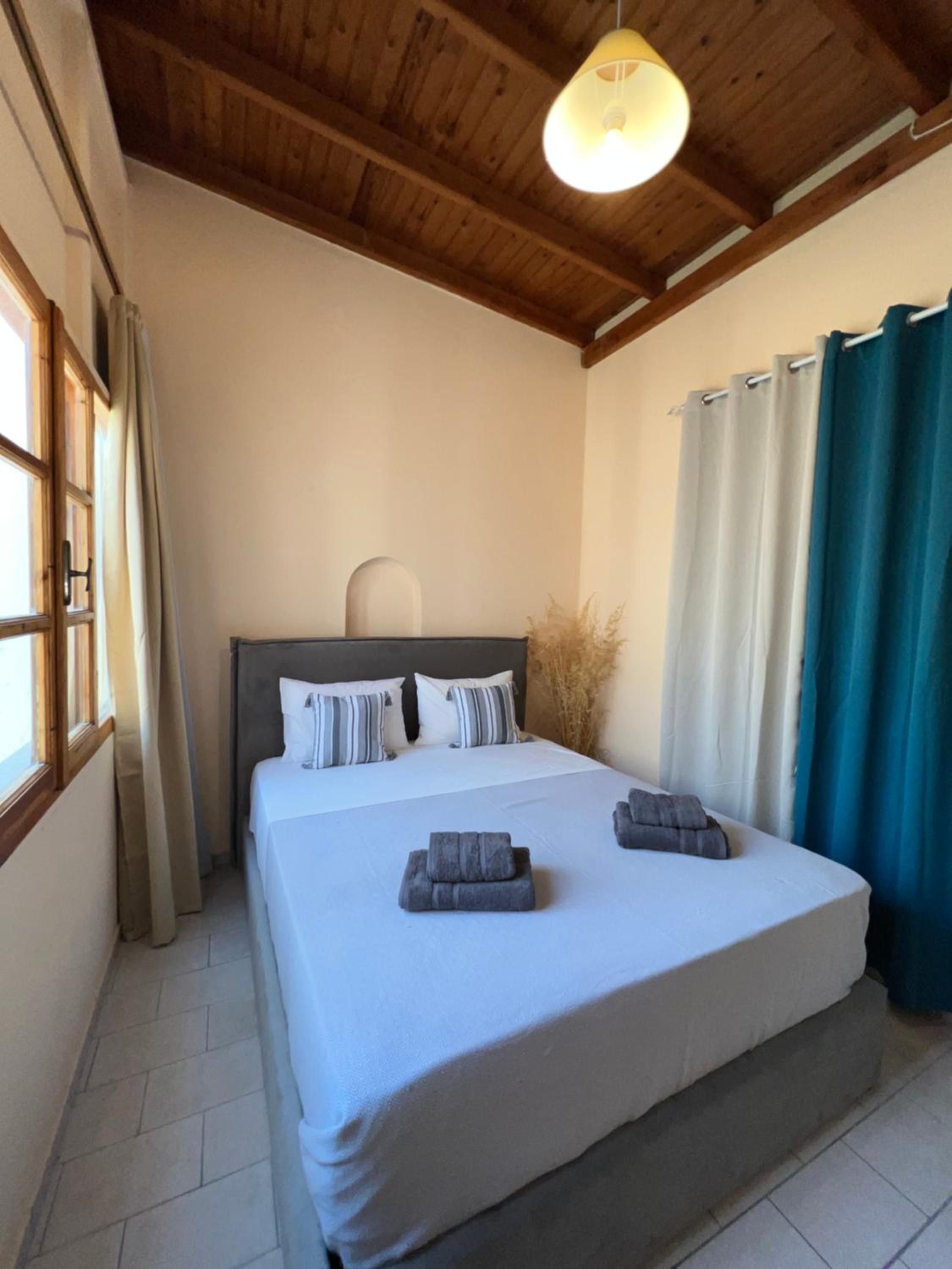 Three-Bedroom House - Photo 26