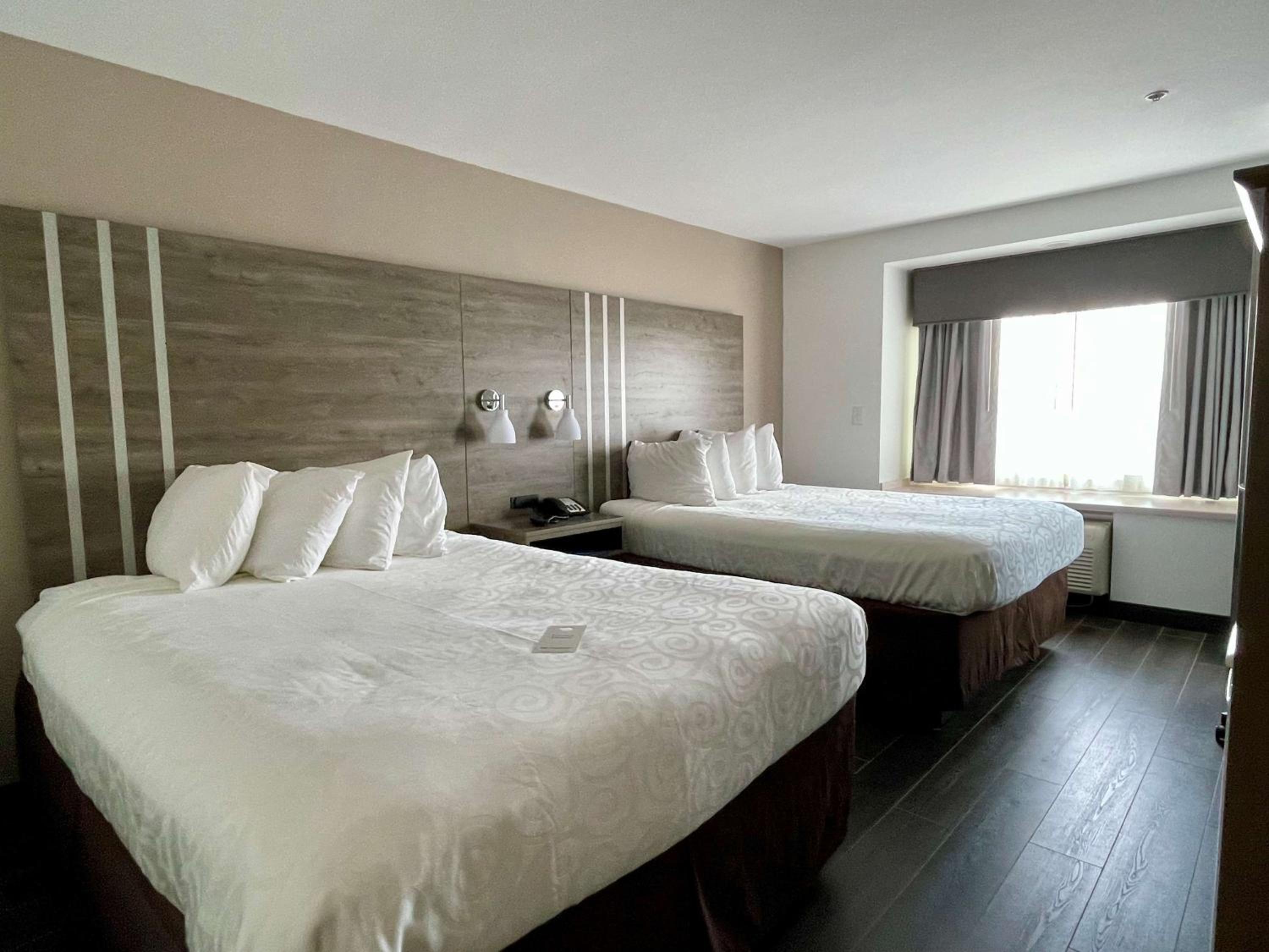 Queen Room with Two Queen Beds - Photo 1