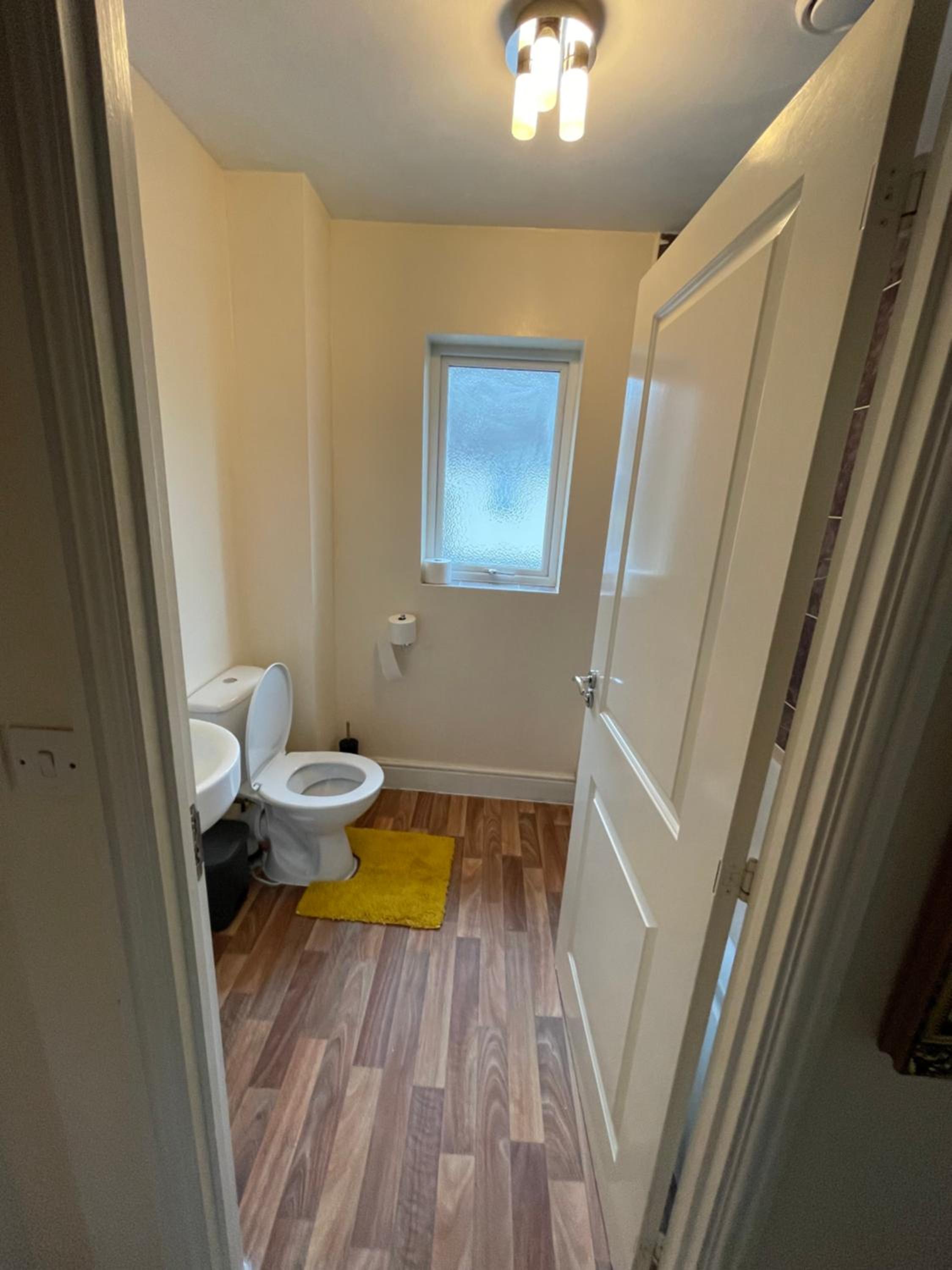 Three-Bedroom House - Photo 19